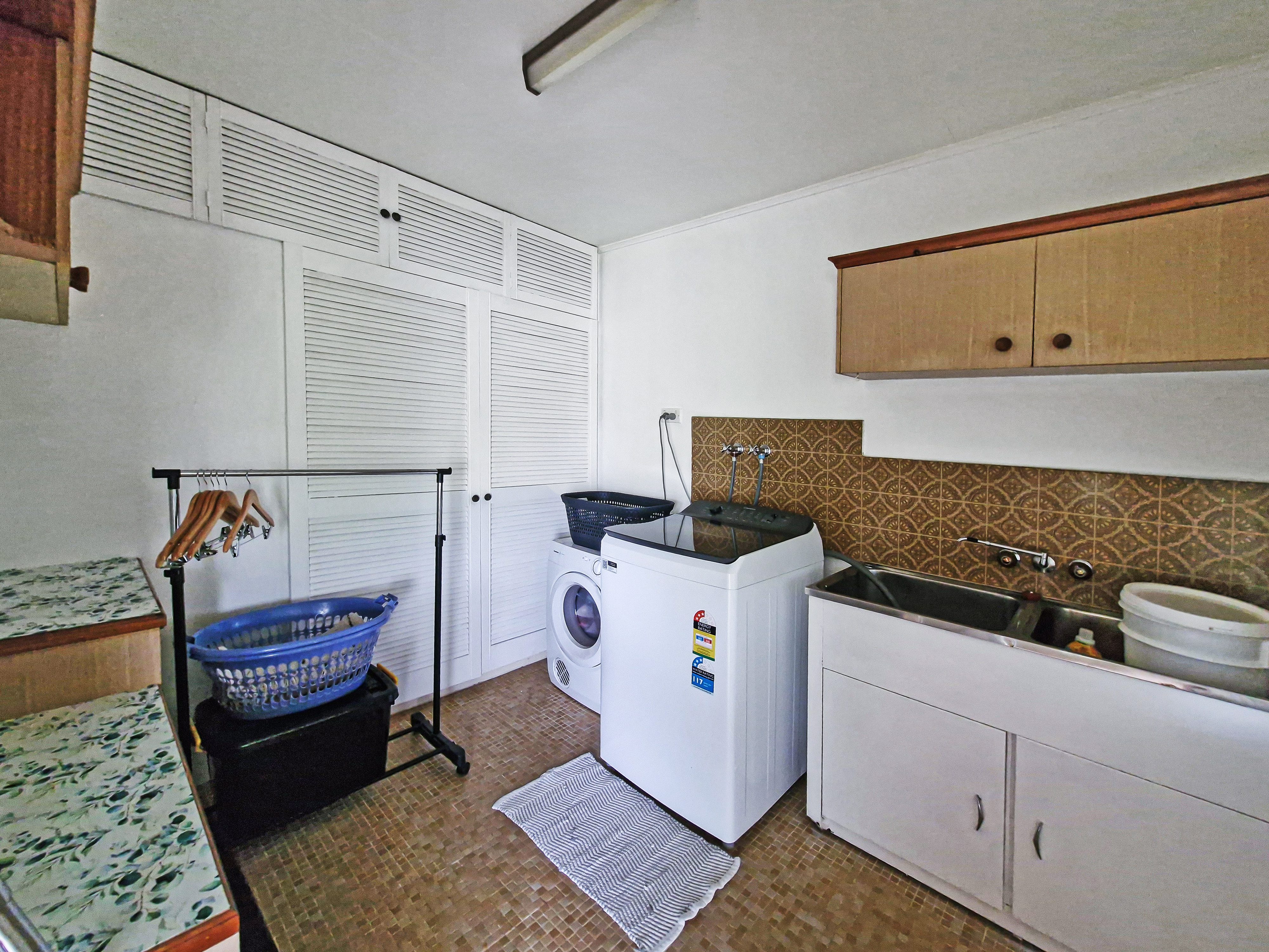 Spacious 5-Acres with Solid Block Home, Income-Generating Studio, and Extensive Sheds & Machinery