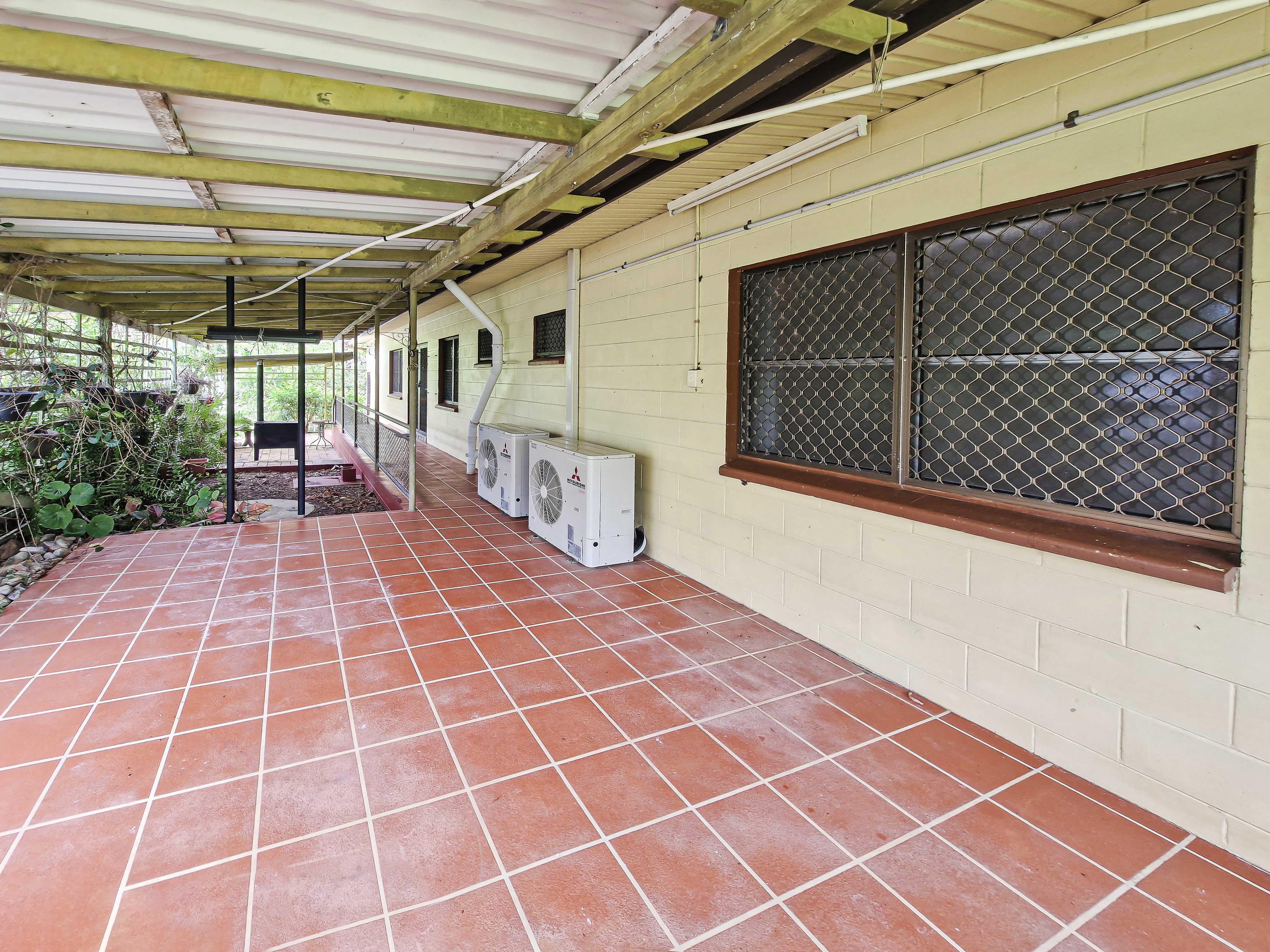 Spacious 5-Acres with Solid Block Home, Income-Generating Studio, and Extensive Sheds & Machinery