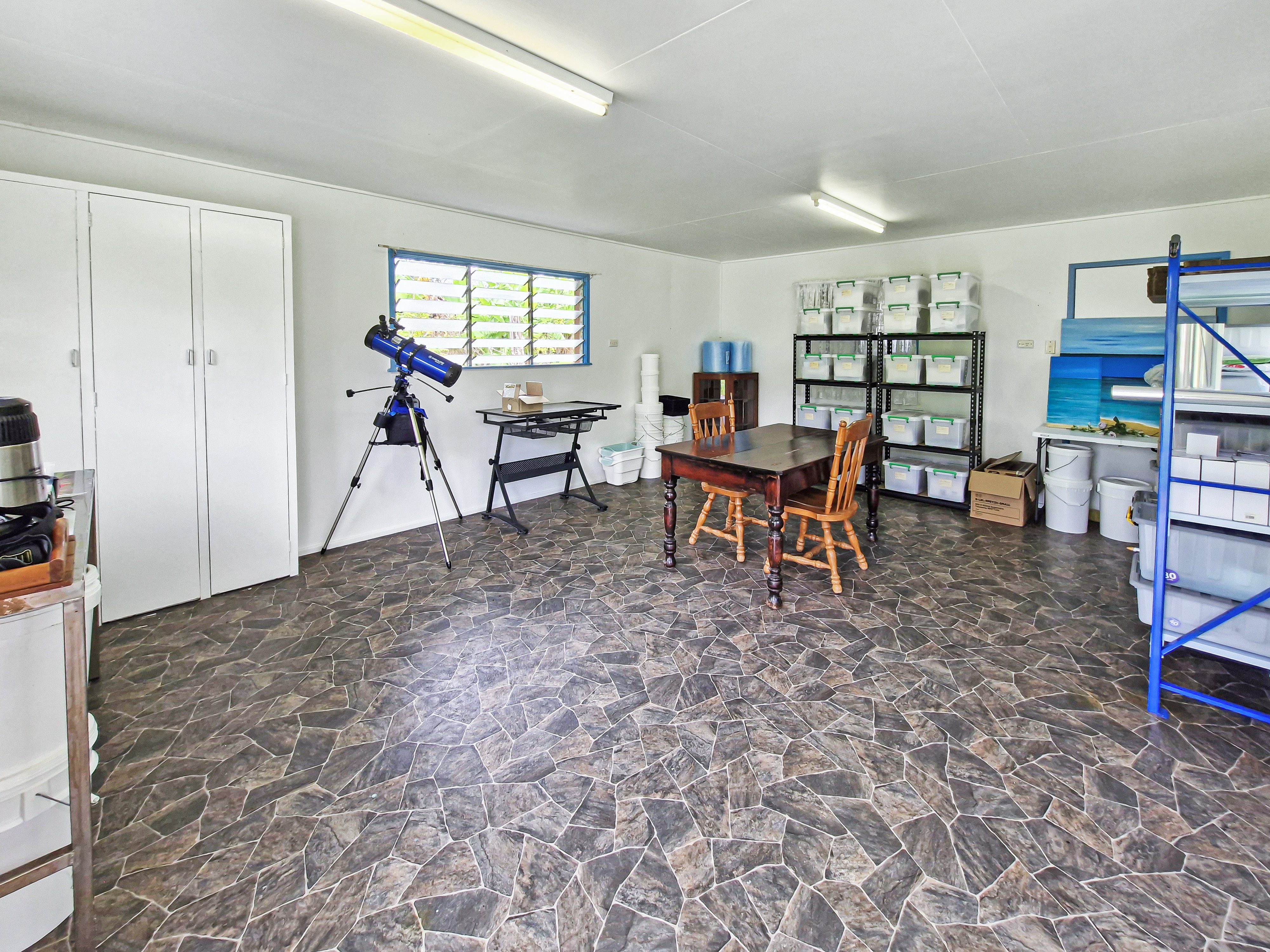 Spacious 5-Acres with Solid Block Home, Income-Generating Studio, and Extensive Sheds & Machinery