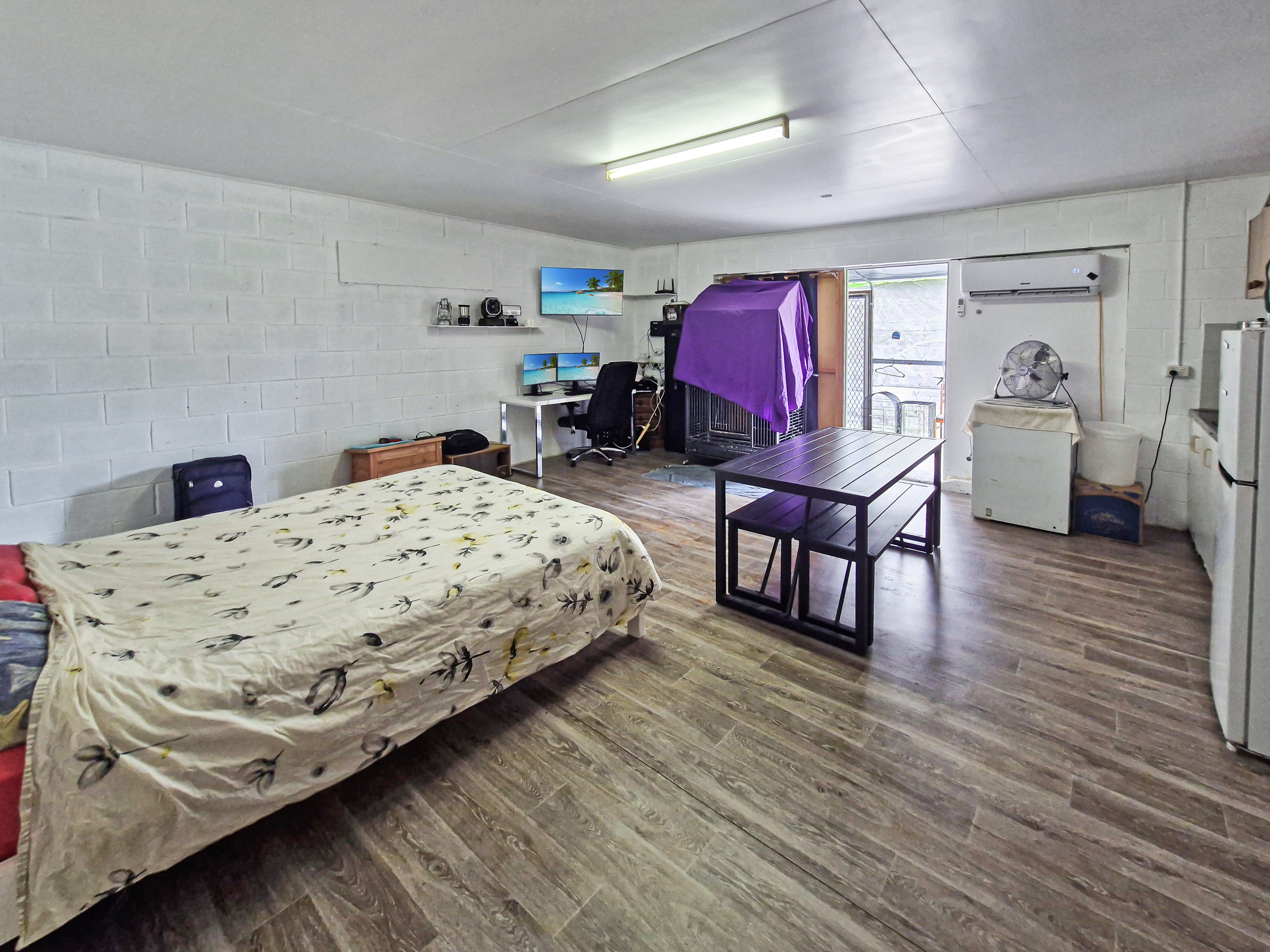 Spacious 5-Acres with Solid Block Home, Income-Generating Studio, and Extensive Sheds & Machinery