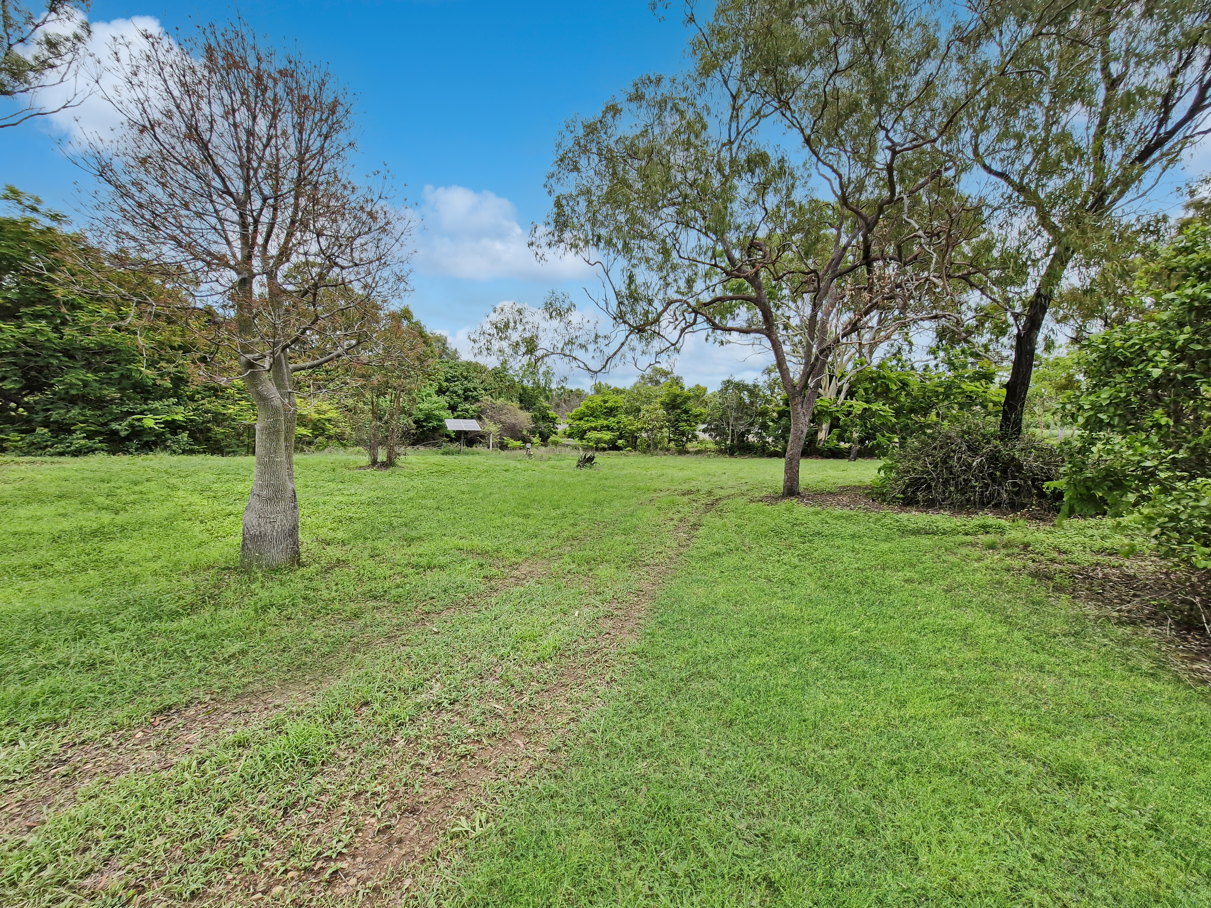 Spacious 5-Acres with Solid Block Home, Income-Generating Studio, and Extensive Sheds & Machinery