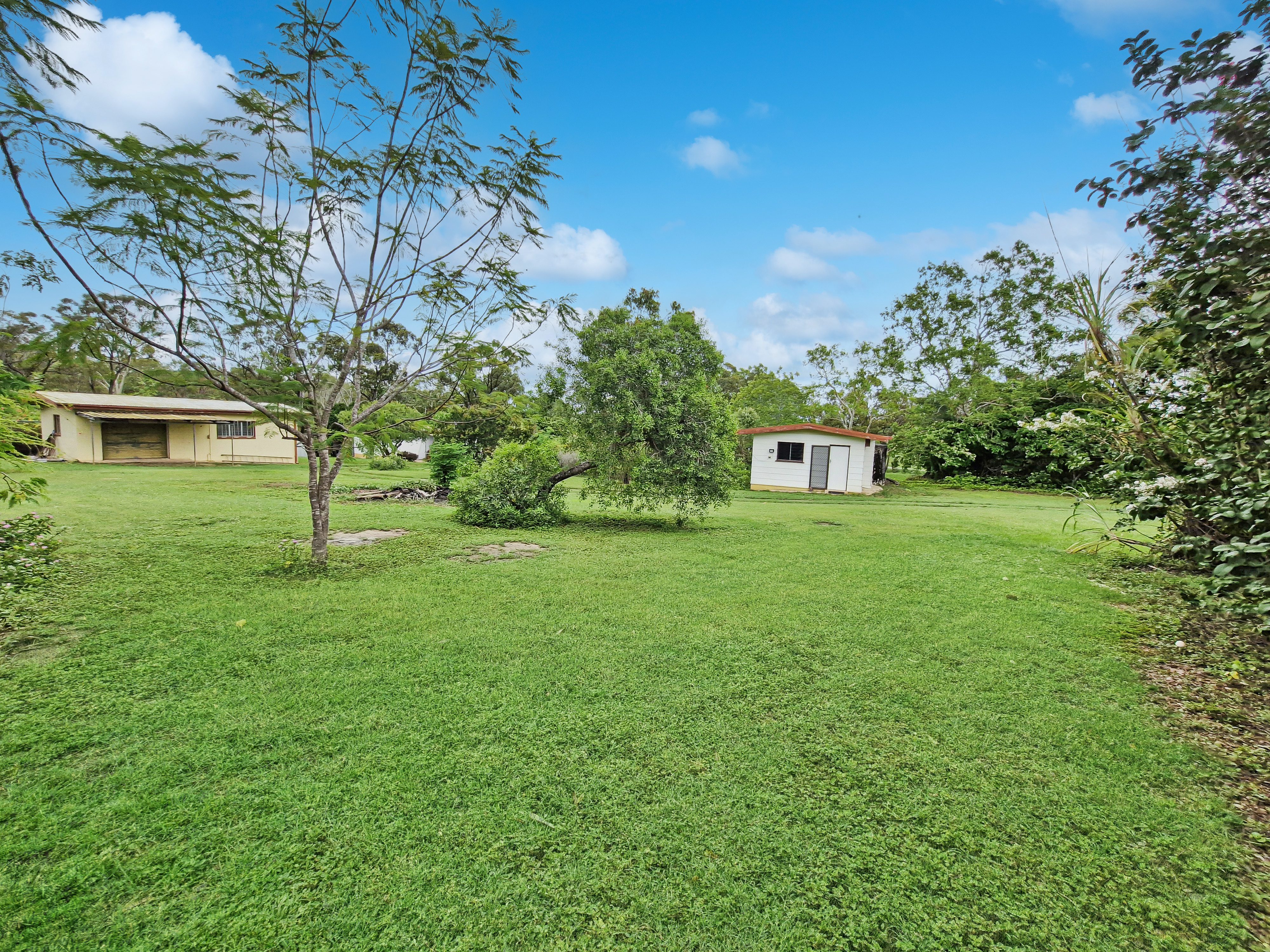 Spacious 5-Acres with Solid Block Home, Income-Generating Studio, and Extensive Sheds & Machinery