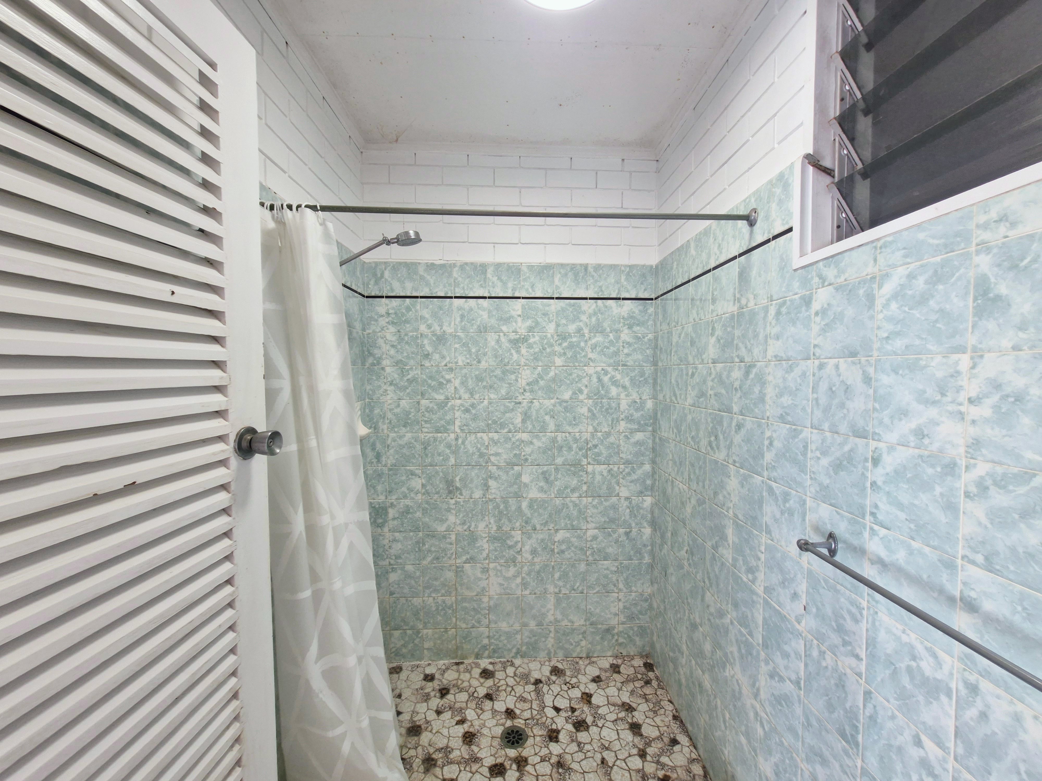 Endless Potential in a Spacious Family Home with Ocean Glimpses and Modern Touches