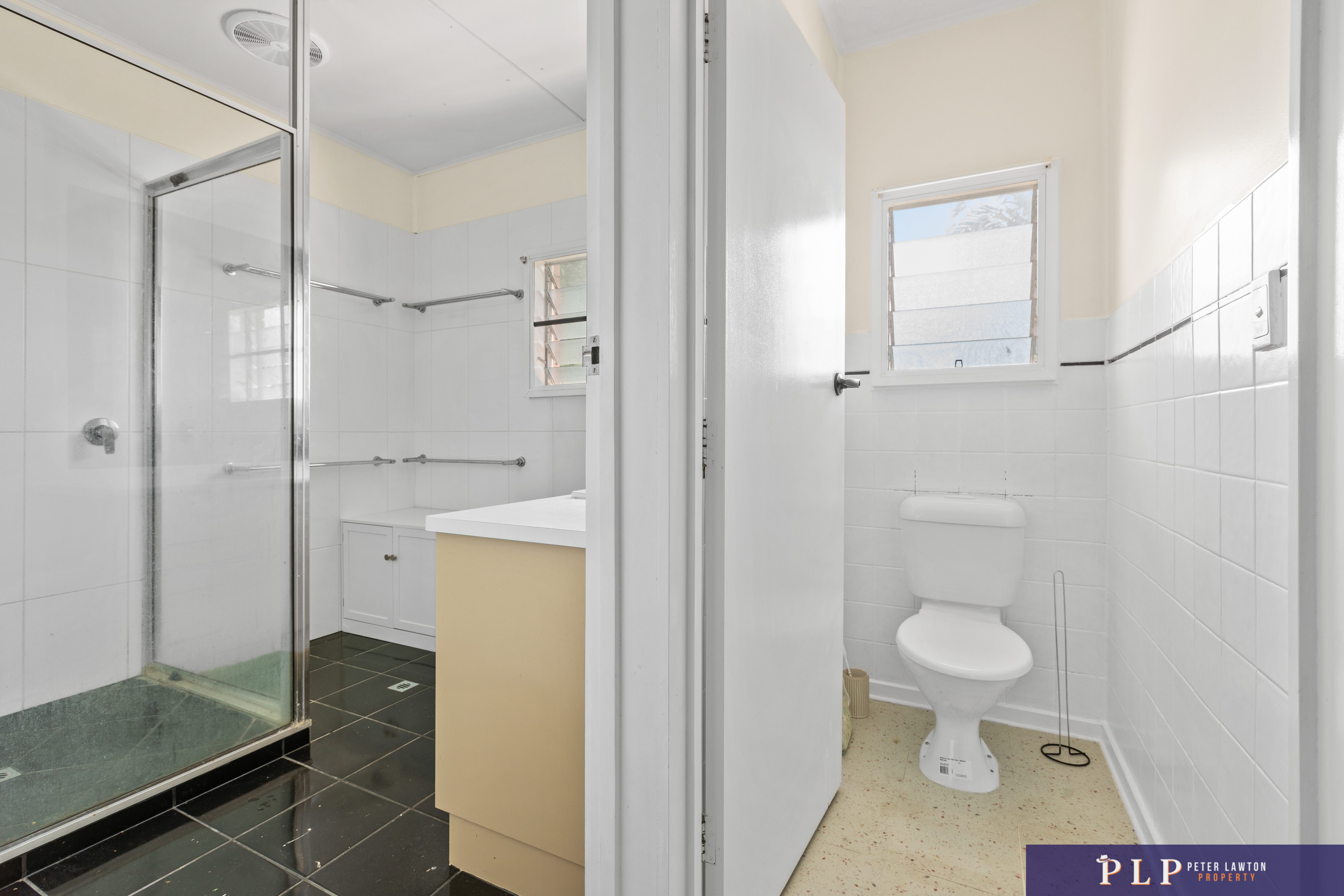 Endless Potential in a Spacious Family Home with Ocean Glimpses and Modern Touches