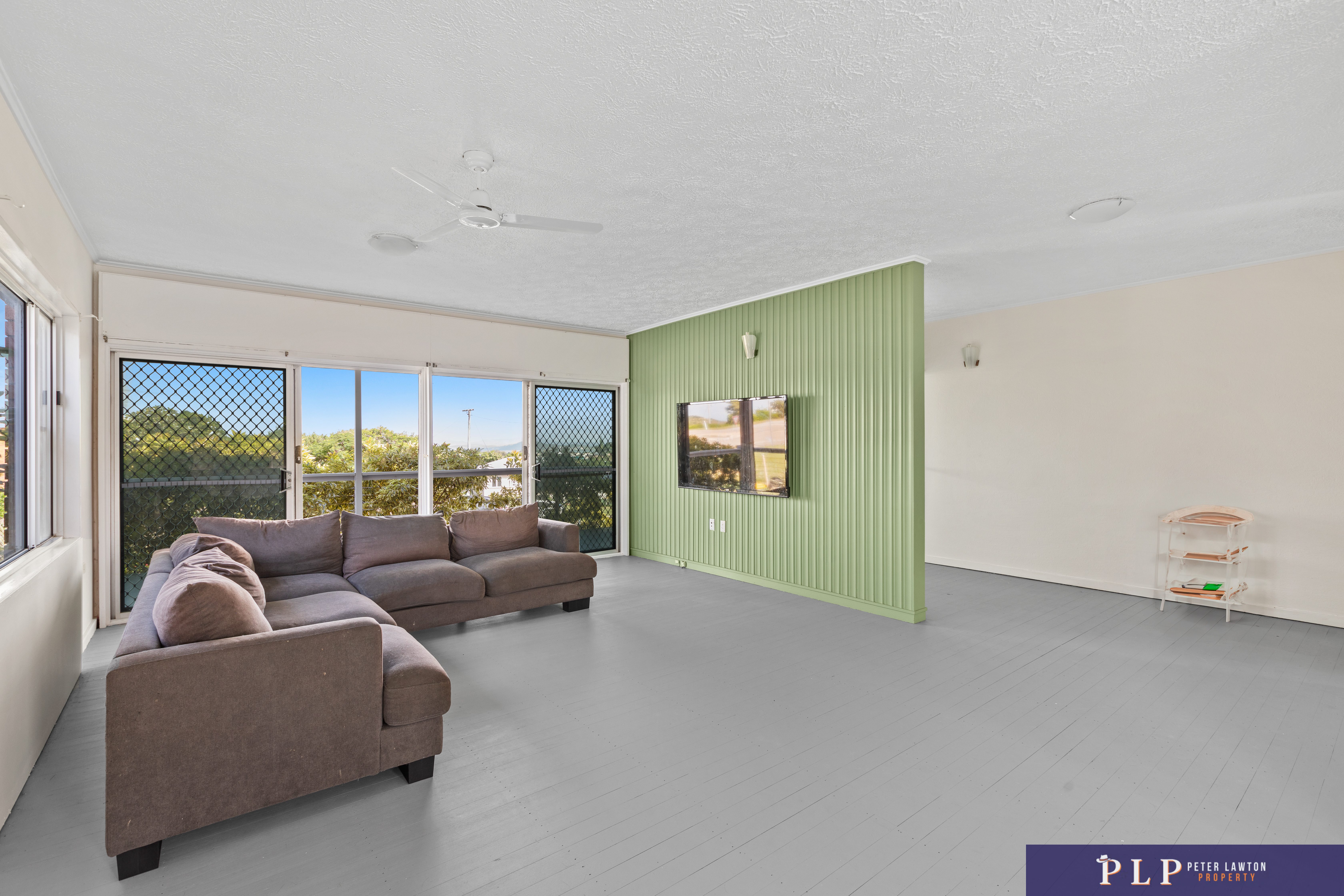 Endless Potential in a Spacious Family Home with Ocean Glimpses and Modern Touches