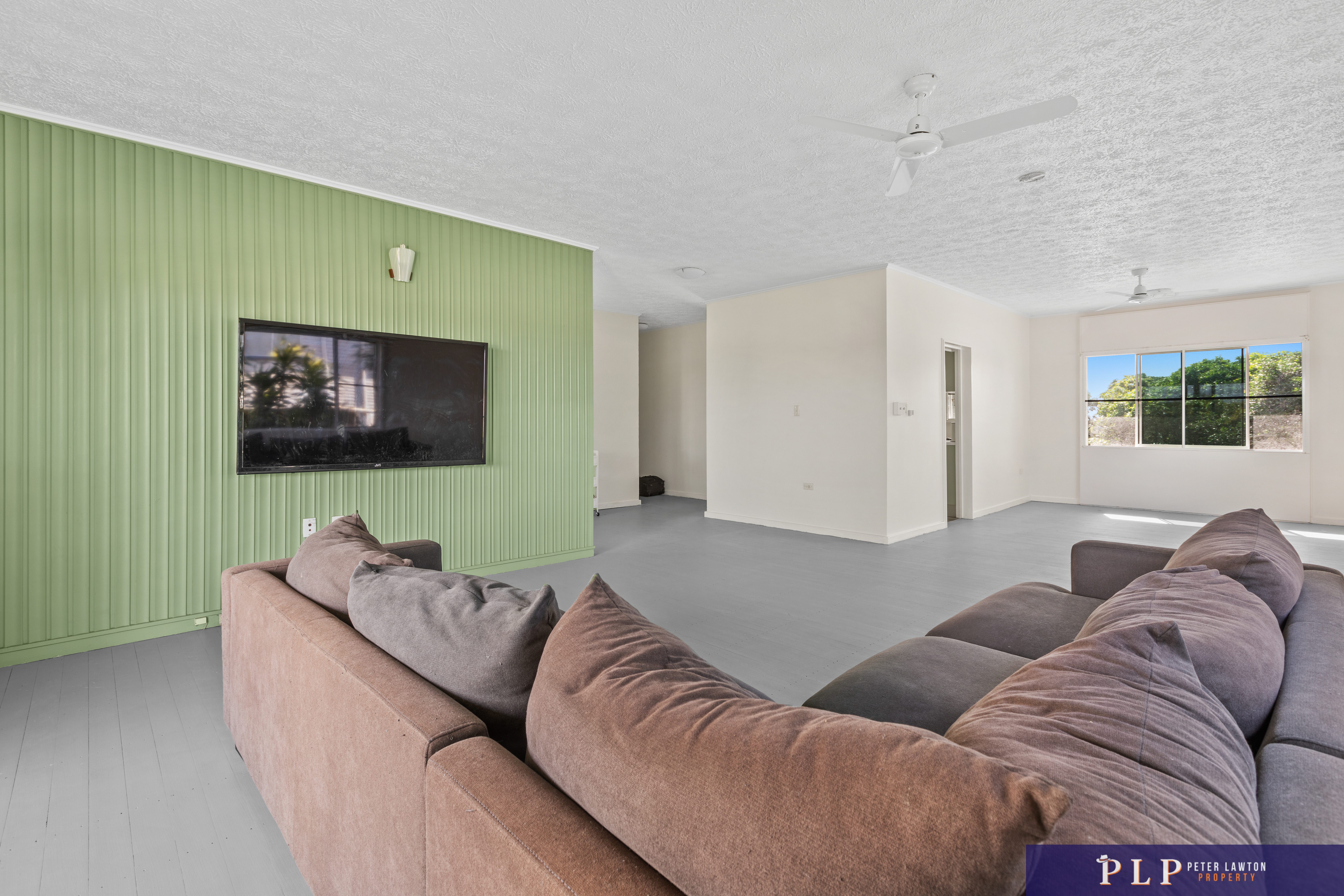 Endless Potential in a Spacious Family Home with Ocean Glimpses and Modern Touches