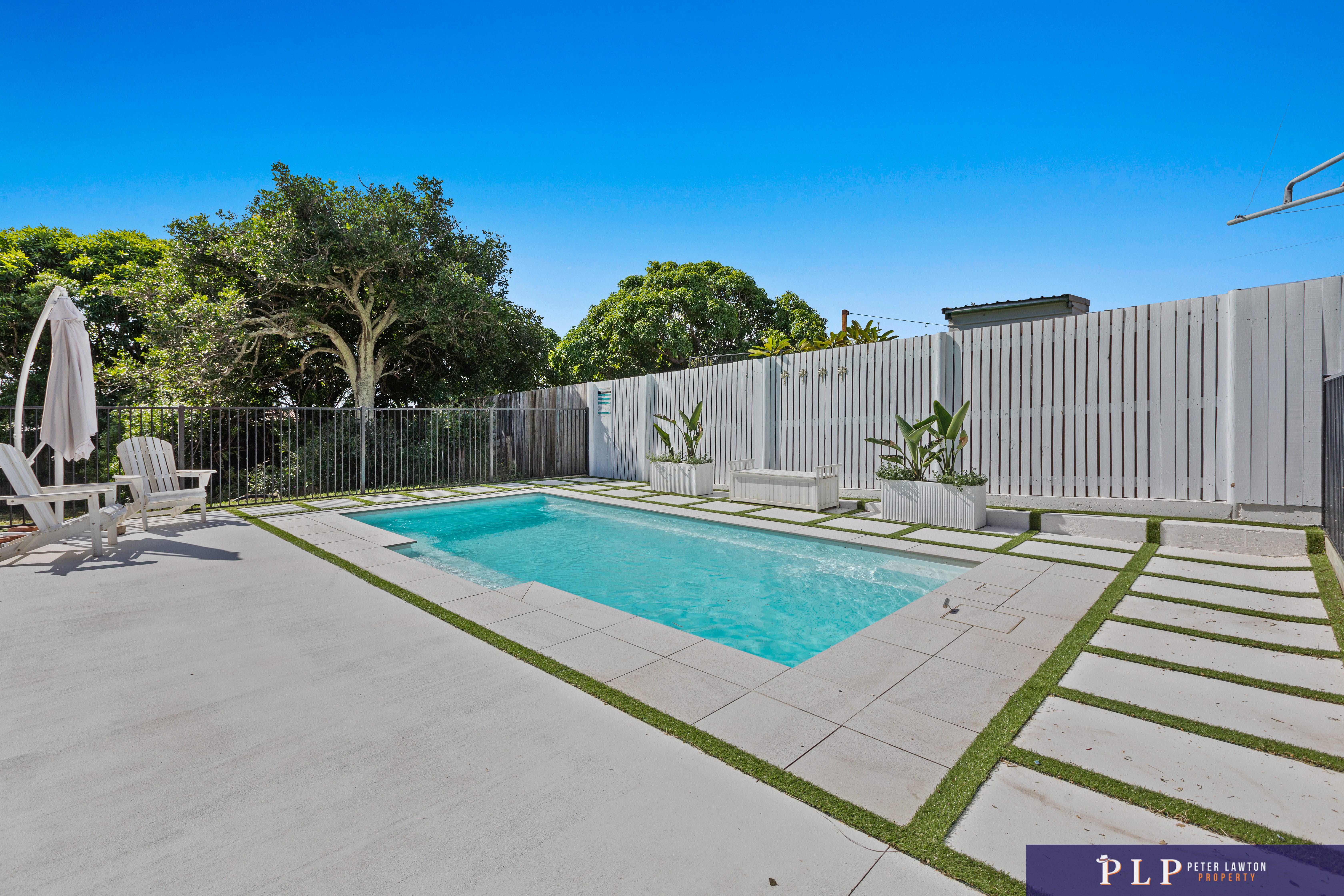 Endless Potential in a Spacious Family Home with Ocean Glimpses and Modern Touches