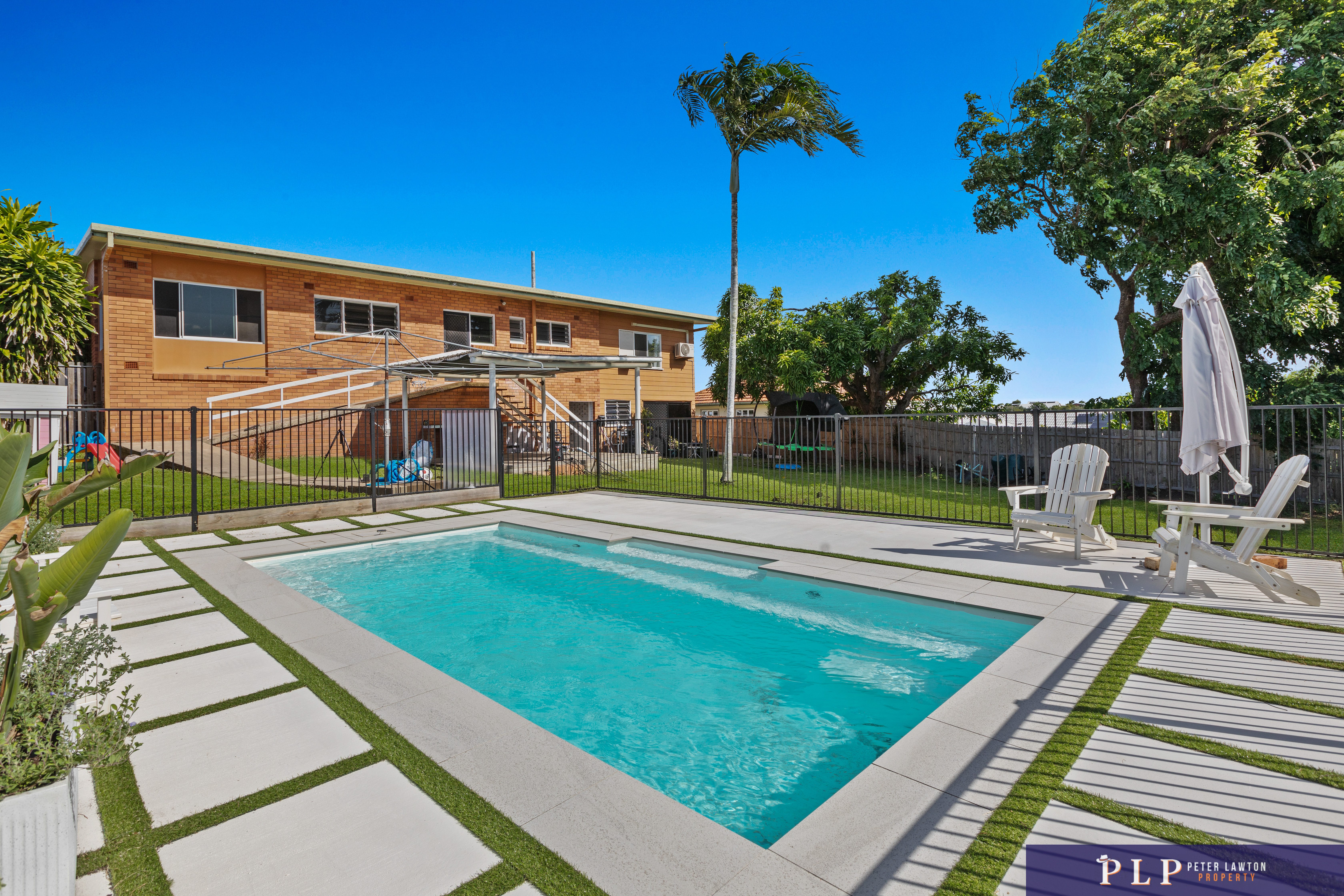 Endless Potential in a Spacious Family Home with Ocean Glimpses and Modern Touches