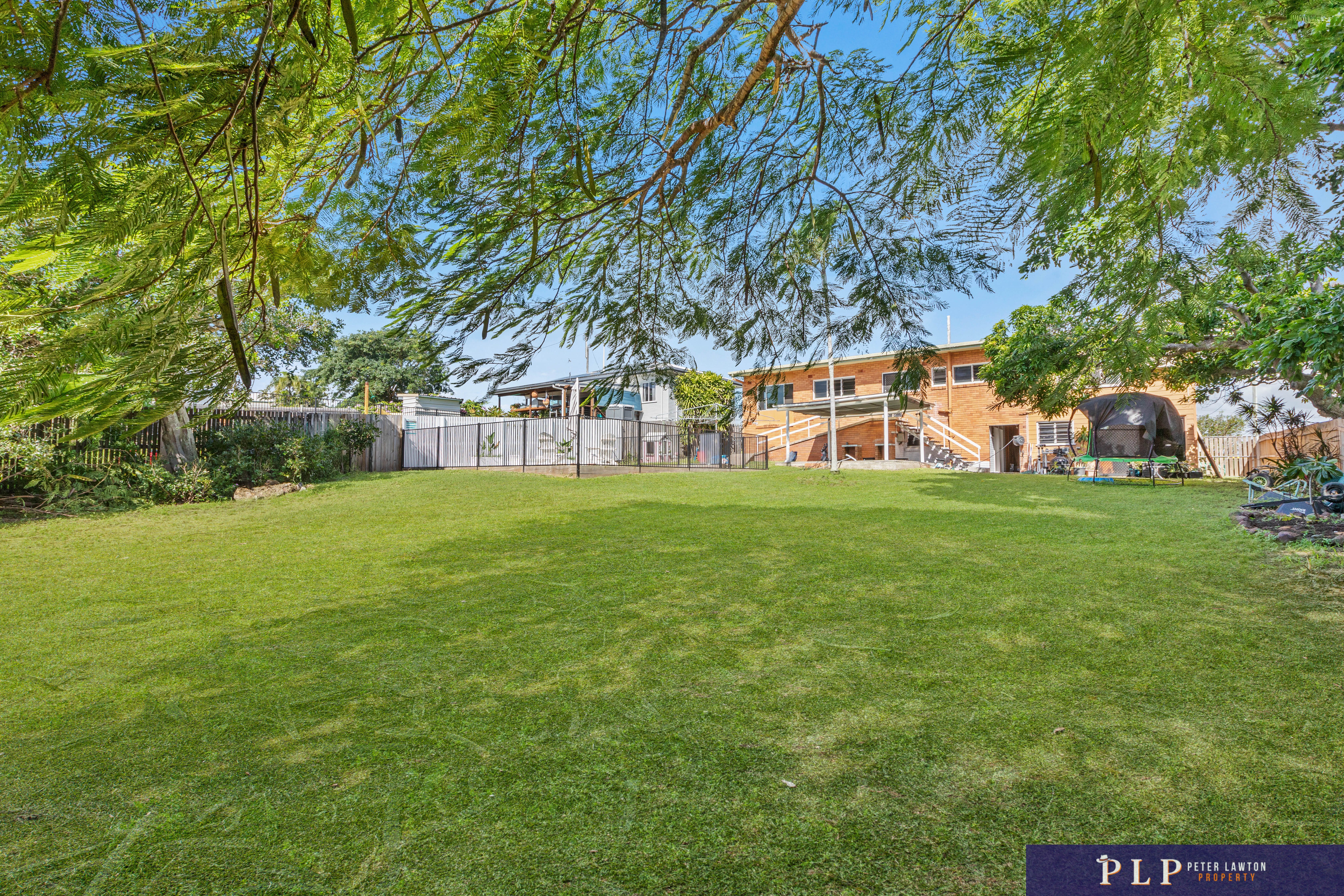 Endless Potential in a Spacious Family Home with Ocean Glimpses and Modern Touches