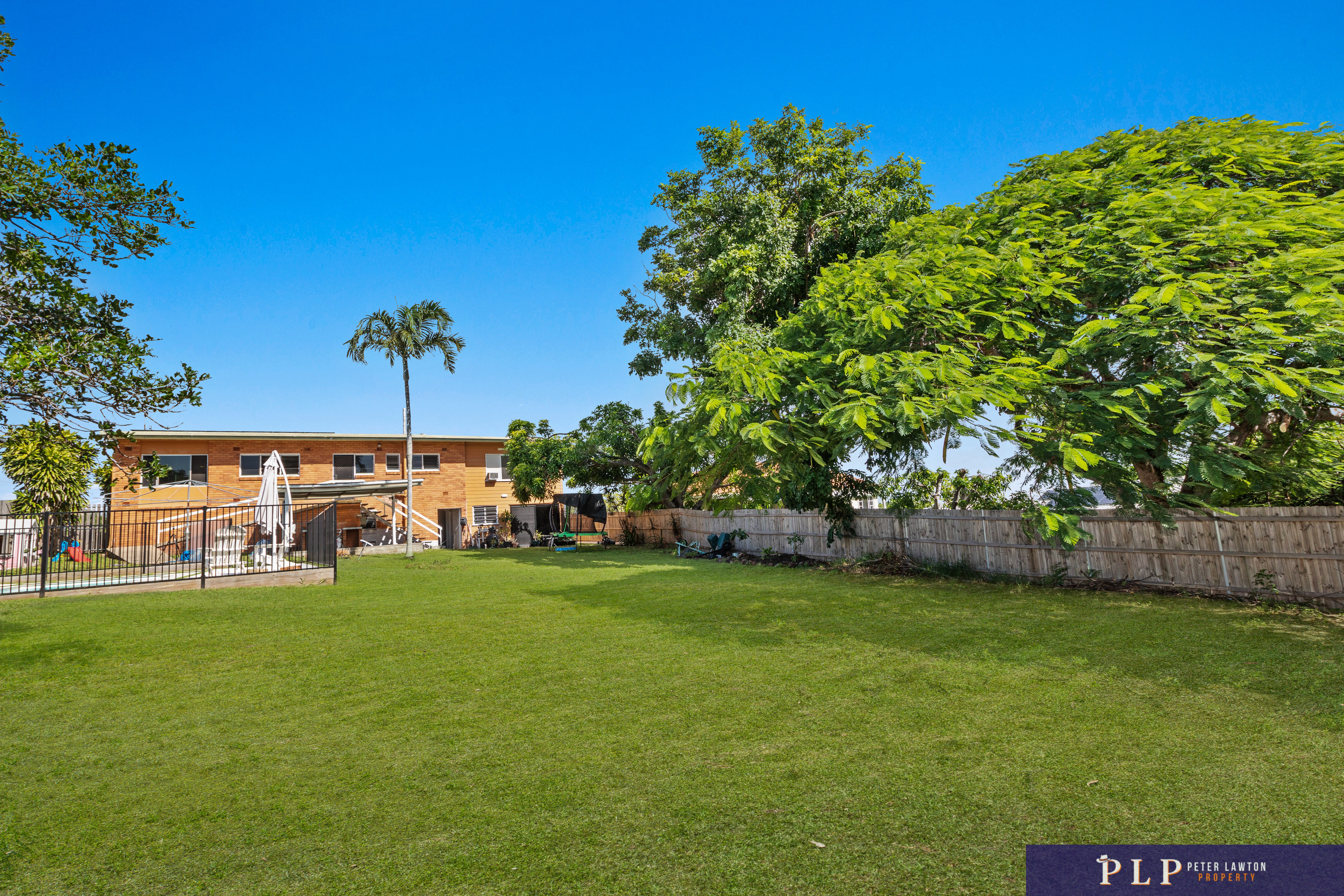 Endless Potential in a Spacious Family Home with Ocean Glimpses and Modern Touches