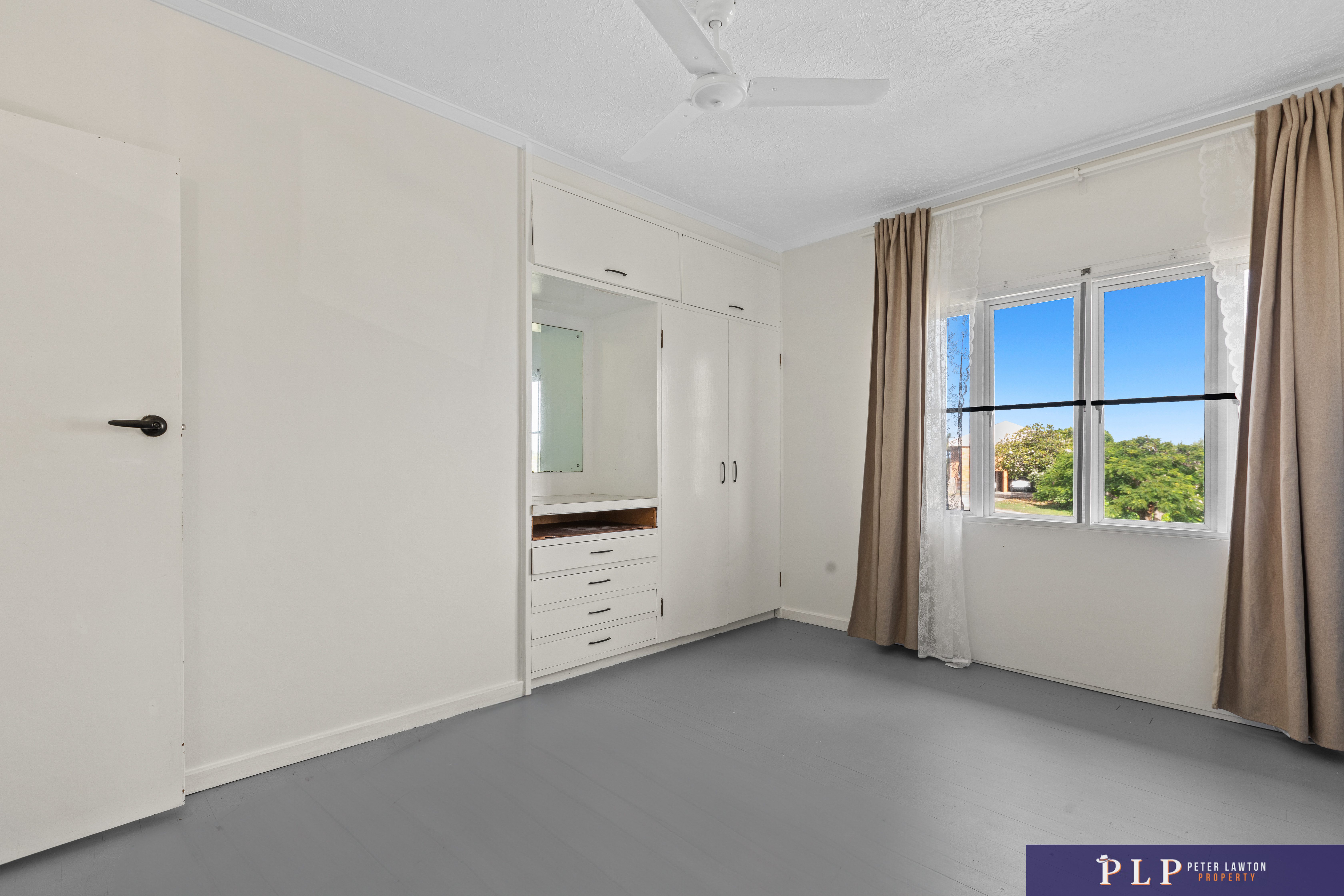 Endless Potential in a Spacious Family Home with Ocean Glimpses and Modern Touches