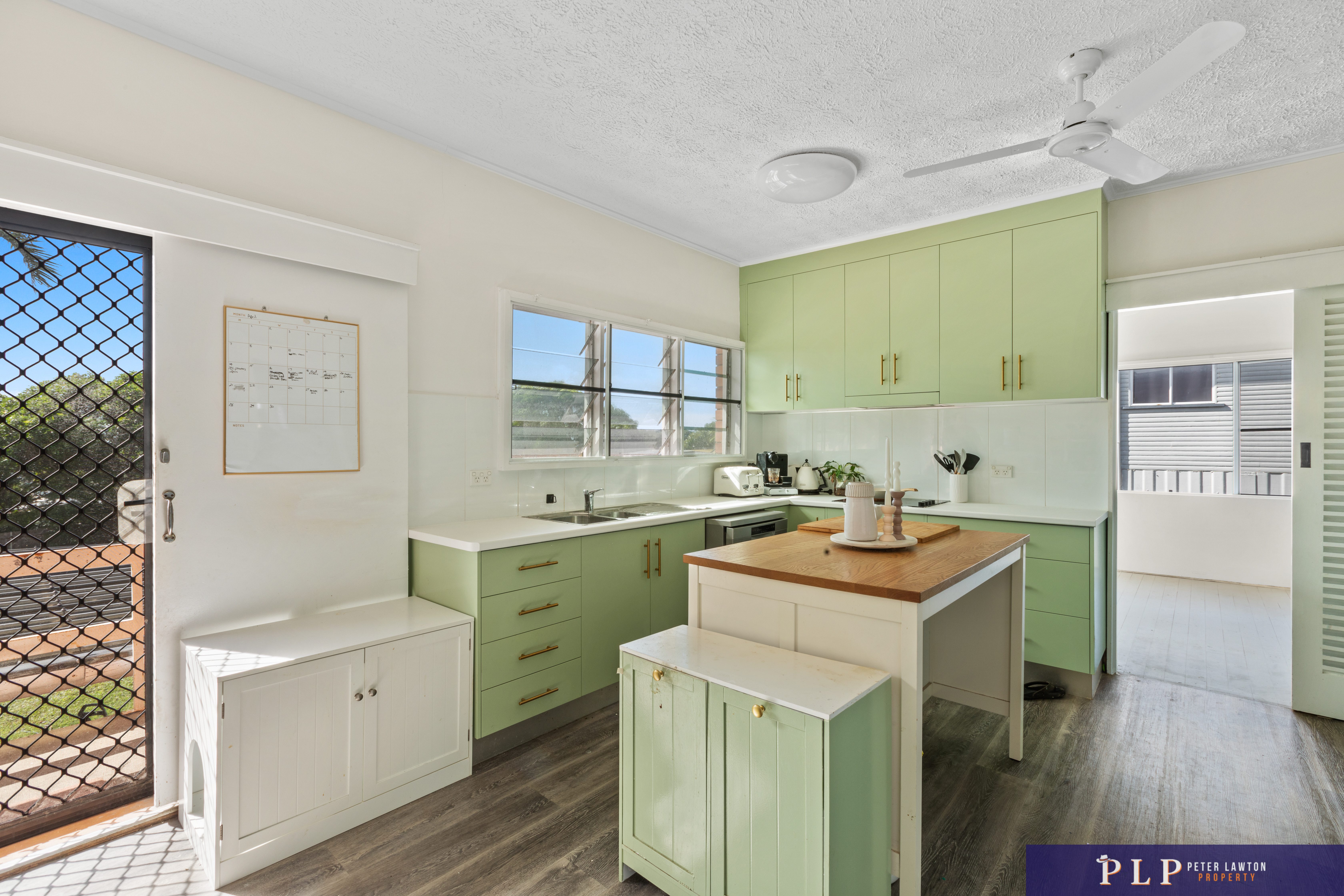 Endless Potential in a Spacious Family Home with Ocean Glimpses and Modern Touches