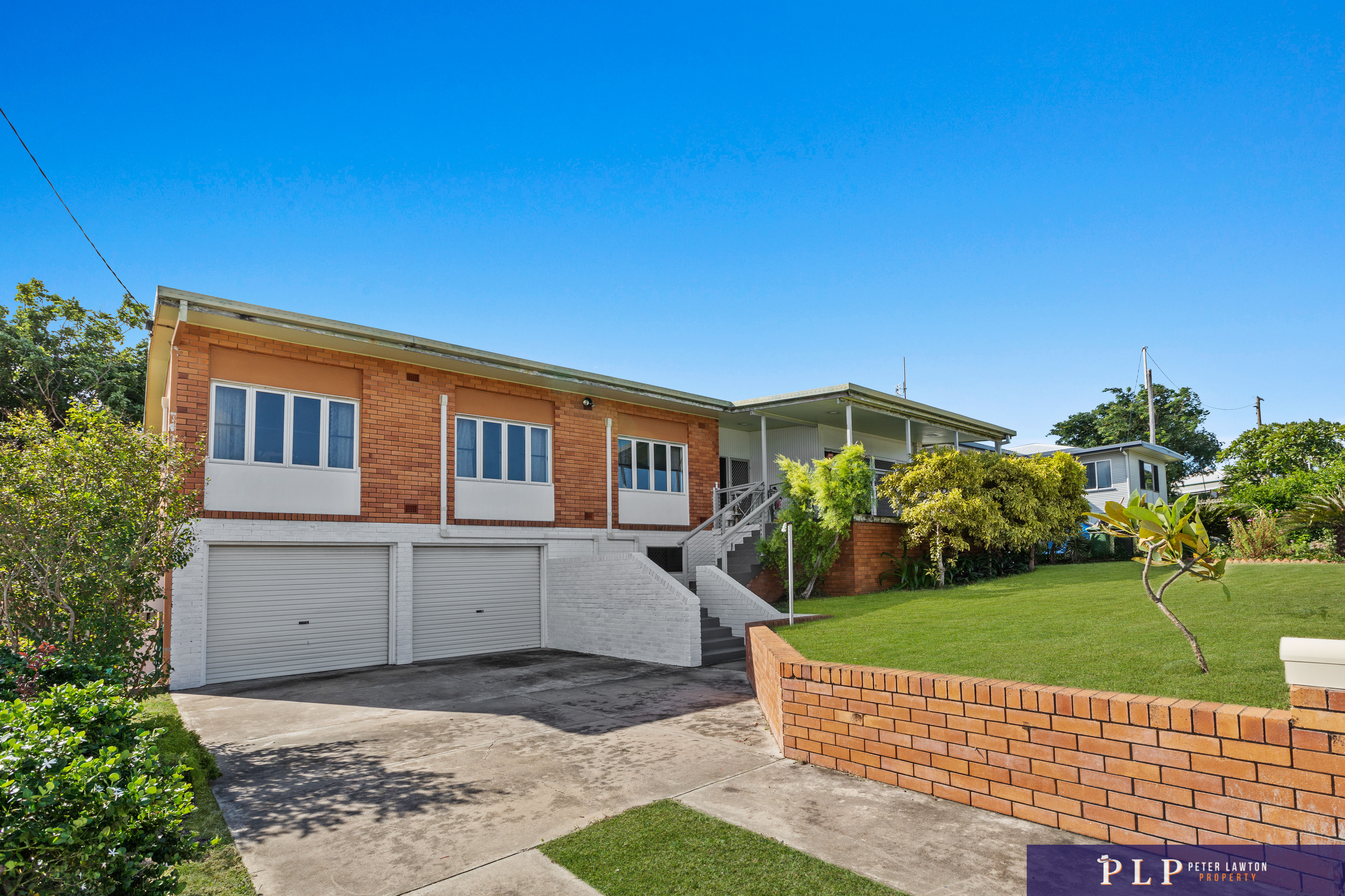 Endless Potential in a Spacious Family Home with Ocean Glimpses and Modern Touches