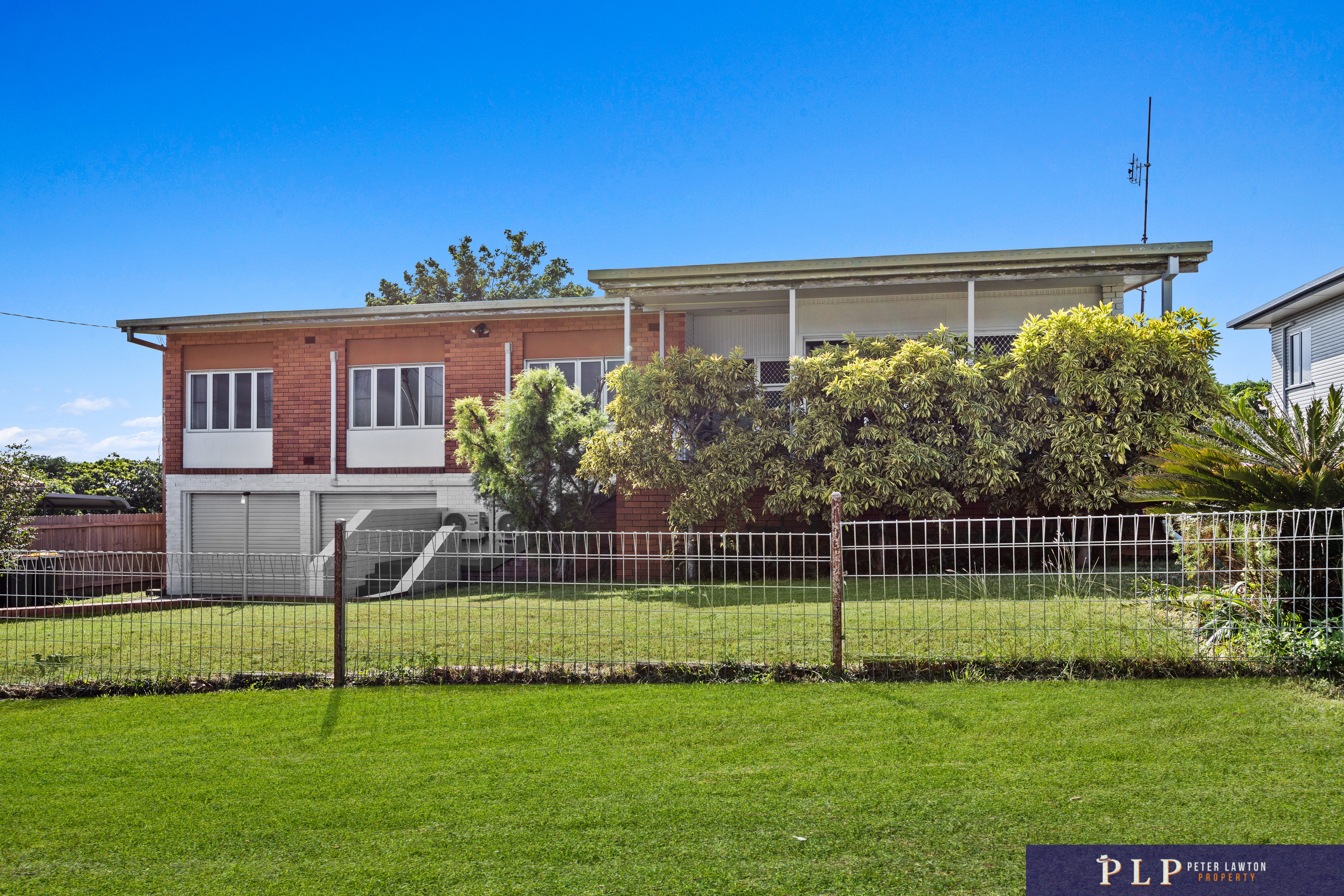 Endless Potential in a Spacious Family Home with Ocean Glimpses and Modern Touches