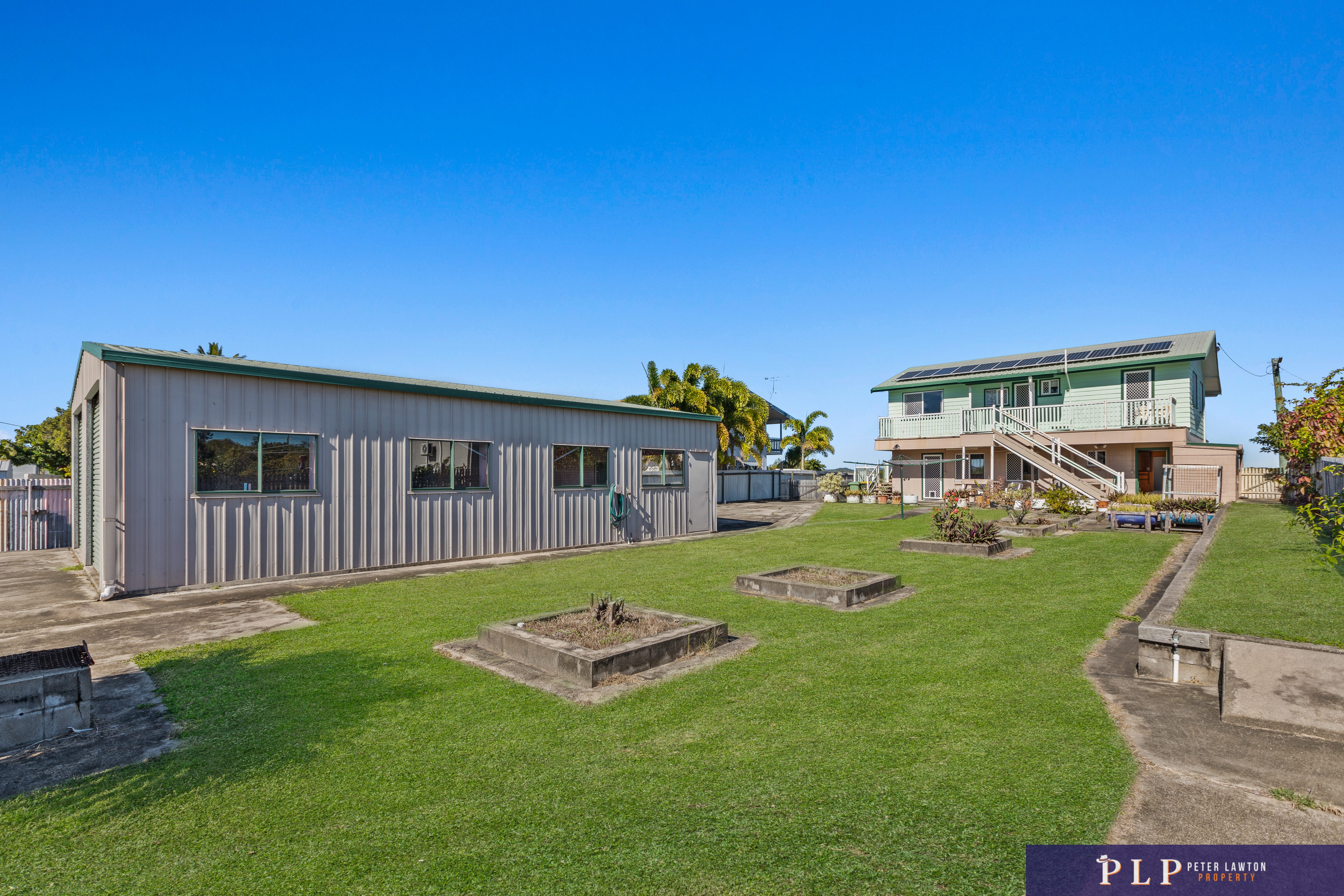Spacious Dual-Level Home with OCEAN VIEWS, Shed, Solar & Extras Galore