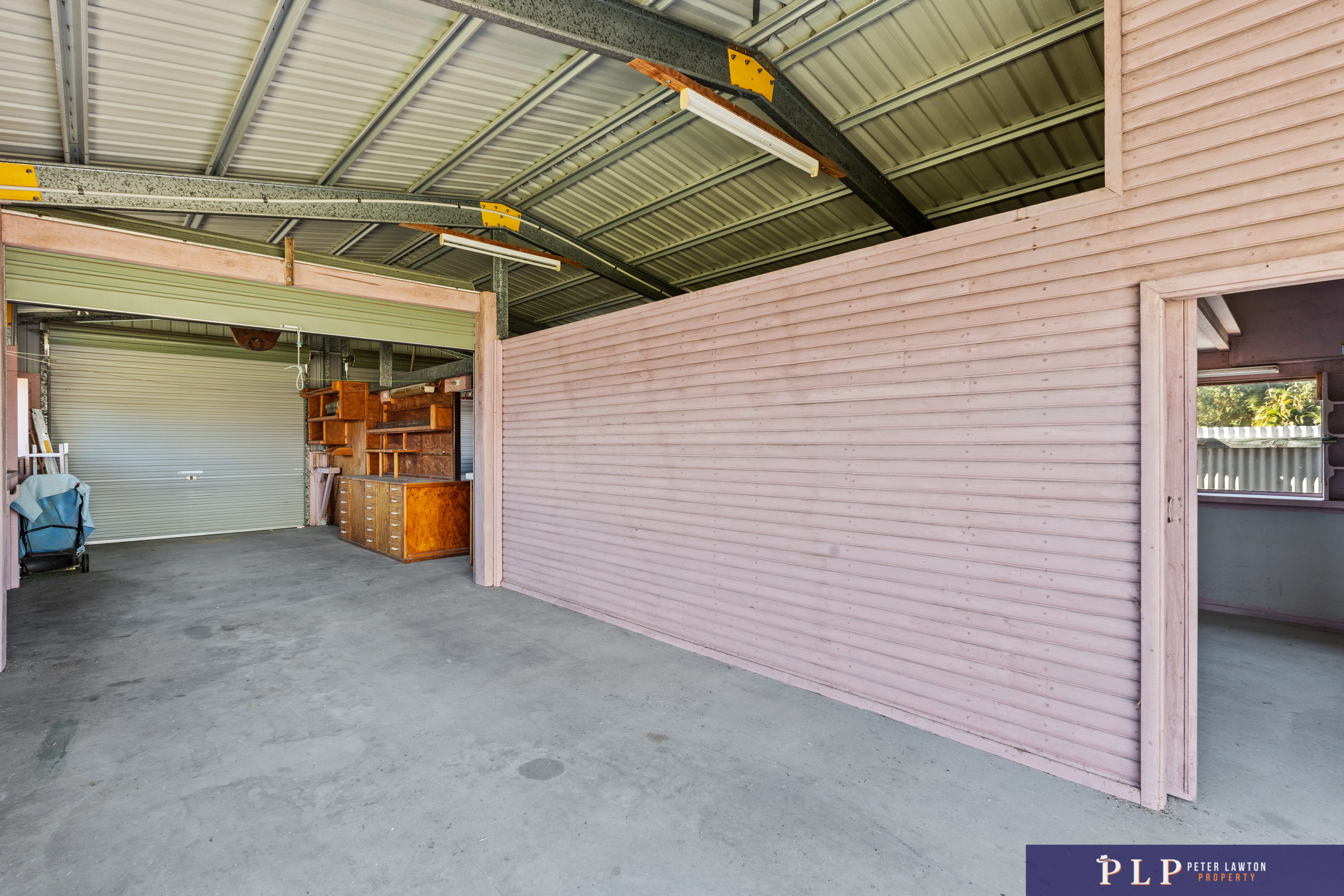 Spacious Dual-Level Home with OCEAN VIEWS, Shed, Solar & Extras Galore