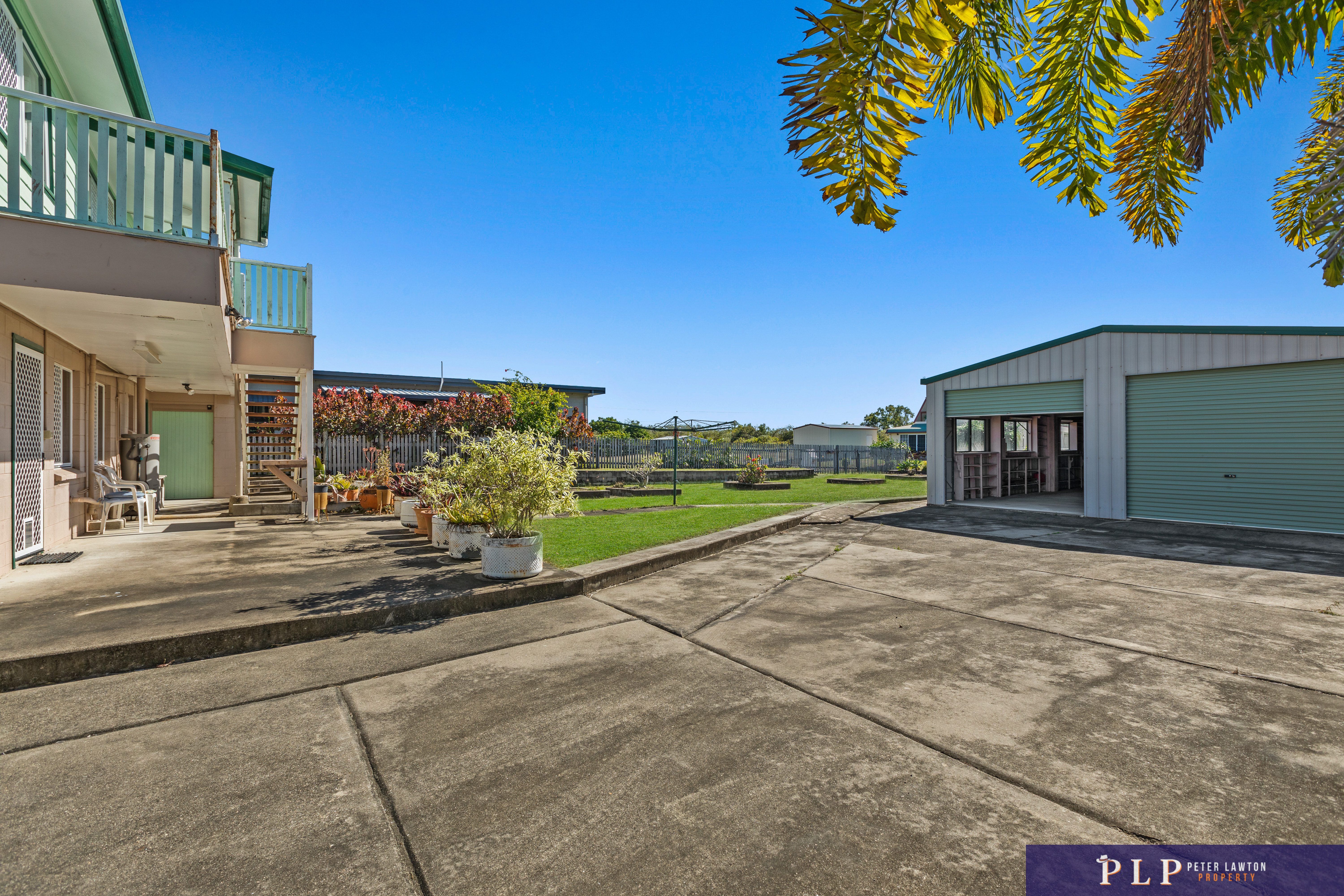 Spacious Dual-Level Home with OCEAN VIEWS, Shed, Solar & Extras Galore