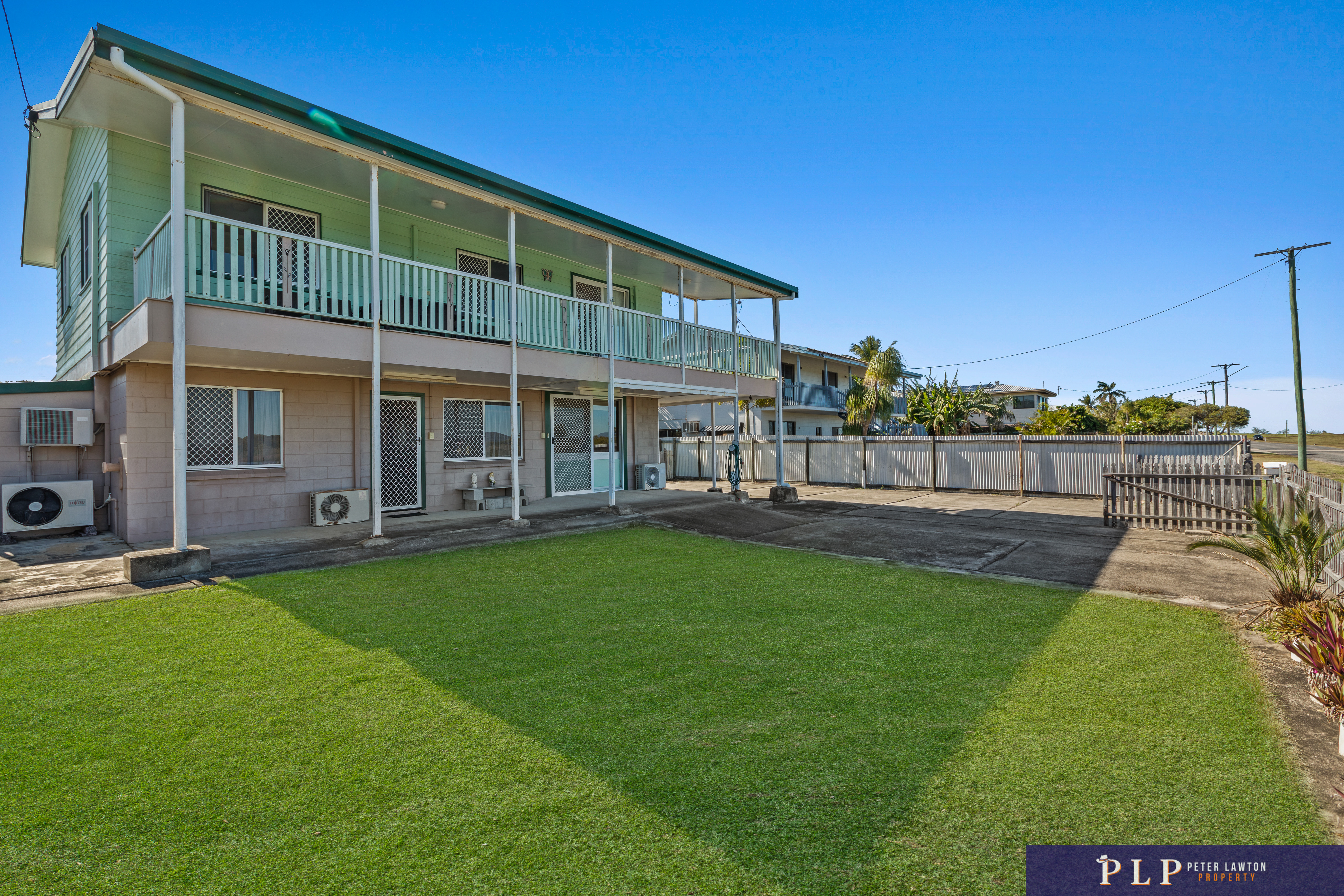 Spacious Dual-Level Home with OCEAN VIEWS, Shed, Solar & Extras Galore