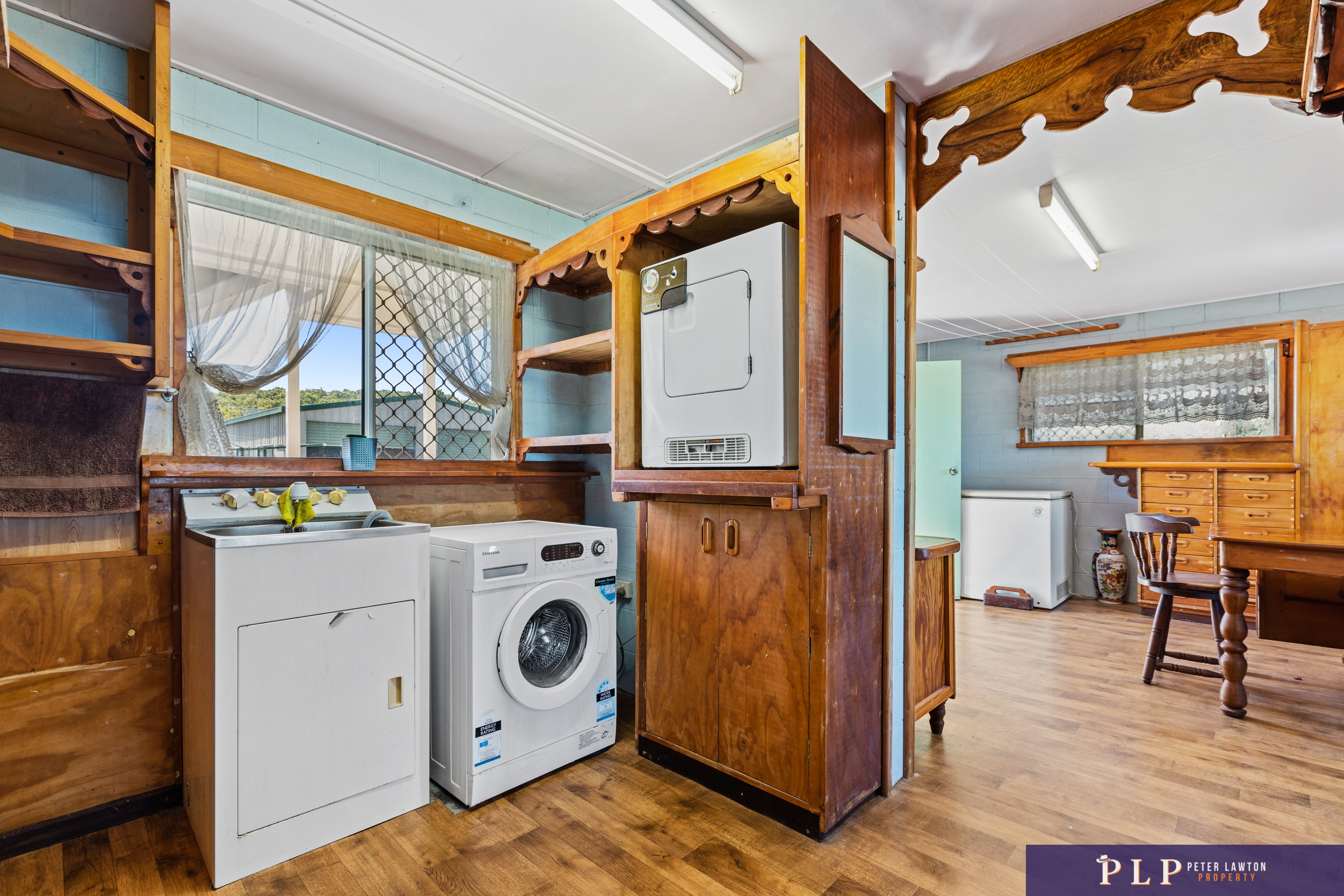 Spacious Dual-Level Home with OCEAN VIEWS, Shed, Solar & Extras Galore