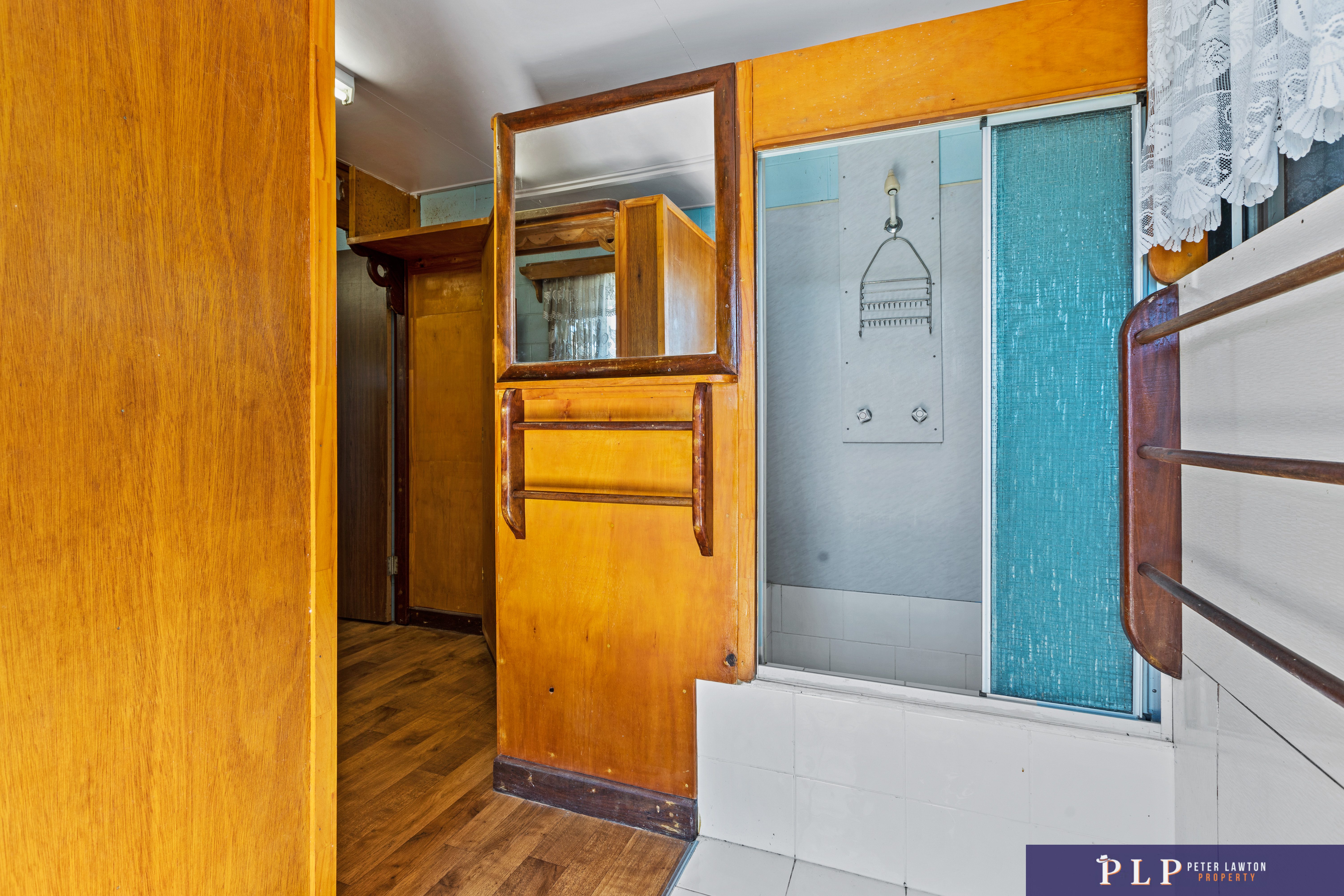 Spacious Dual-Level Home with OCEAN VIEWS, Shed, Solar & Extras Galore