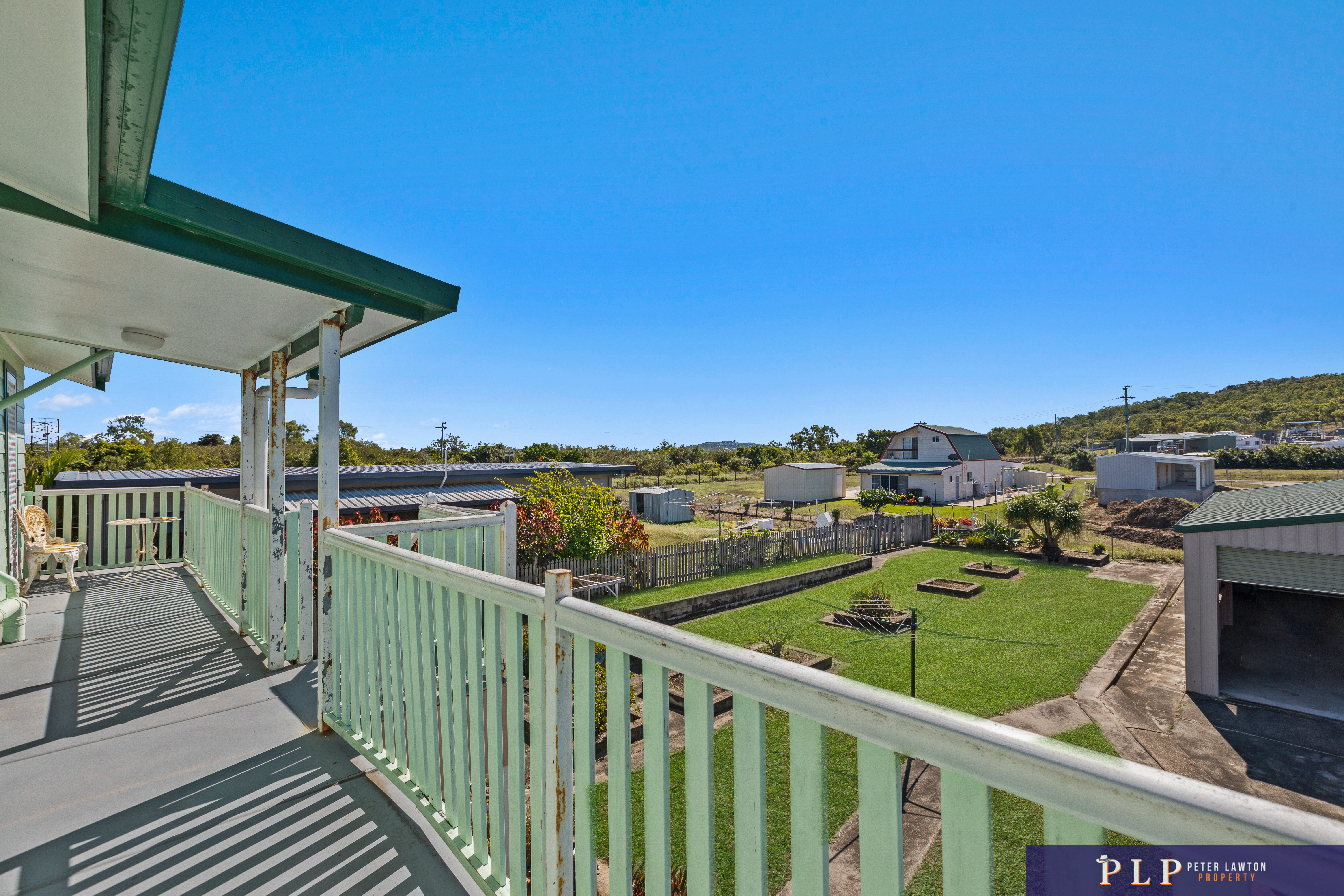 Spacious Dual-Level Home with OCEAN VIEWS, Shed, Solar & Extras Galore