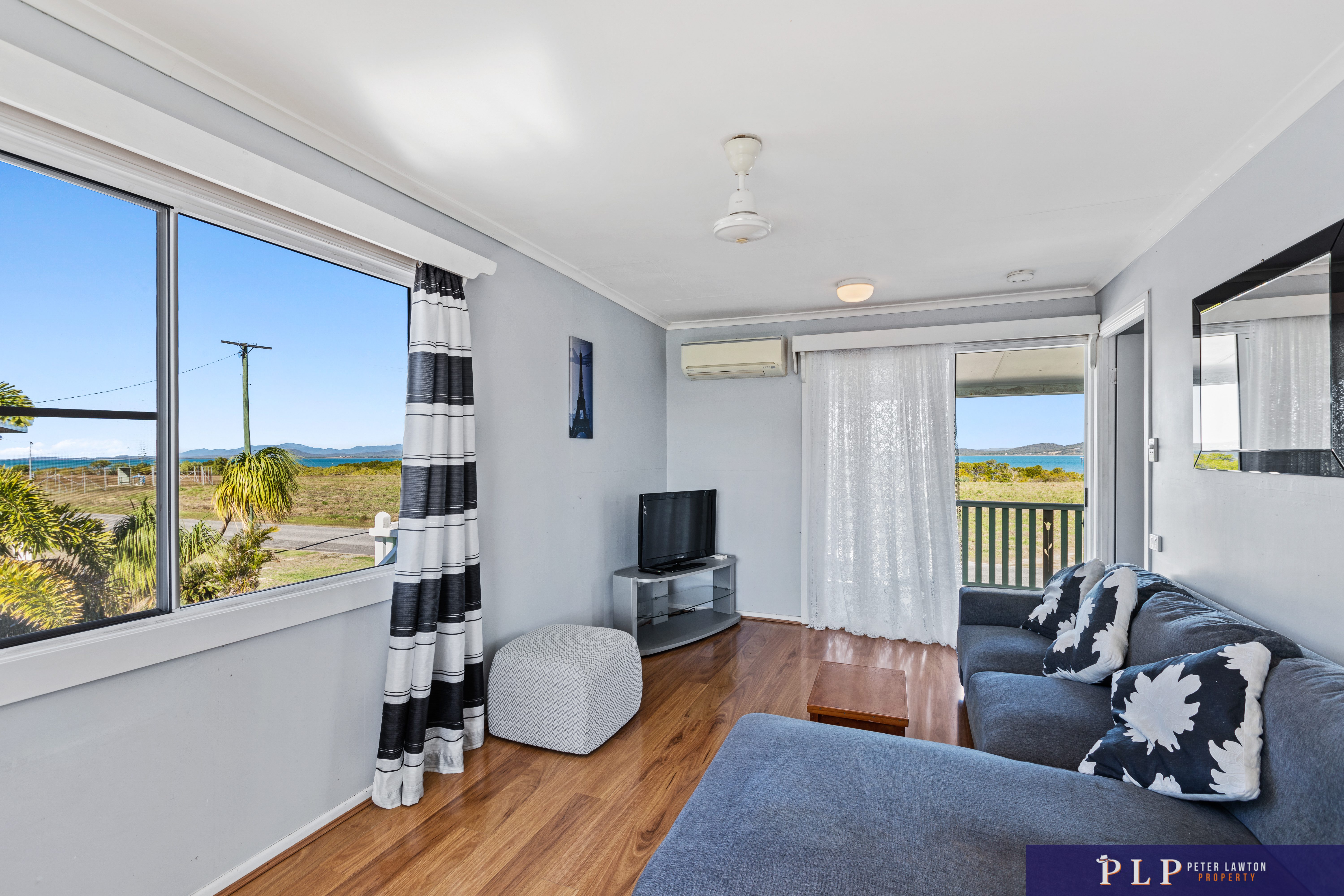 Spacious Dual-Level Home with OCEAN VIEWS, Shed, Solar & Extras Galore