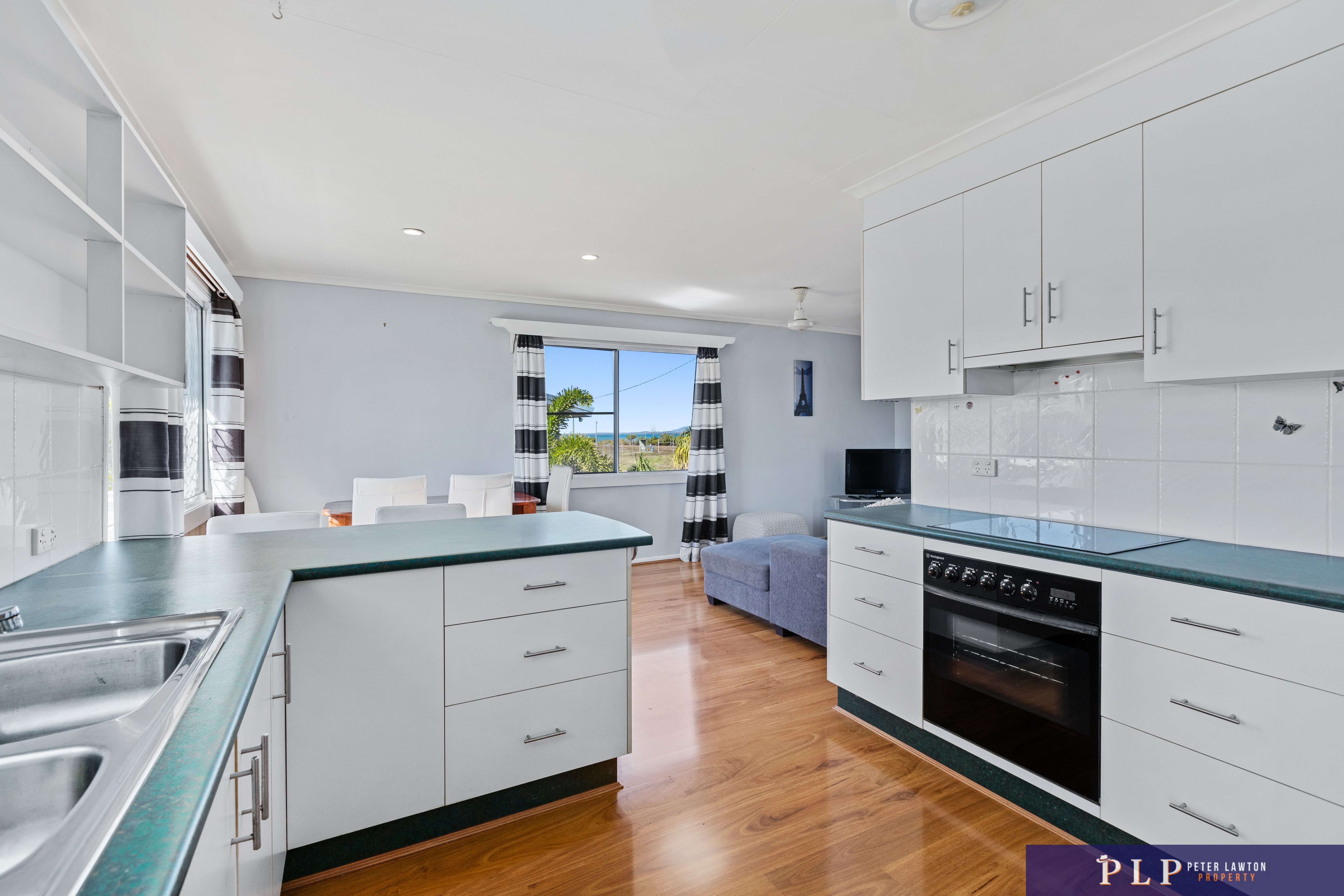 Spacious Dual-Level Home with OCEAN VIEWS, Shed, Solar & Extras Galore