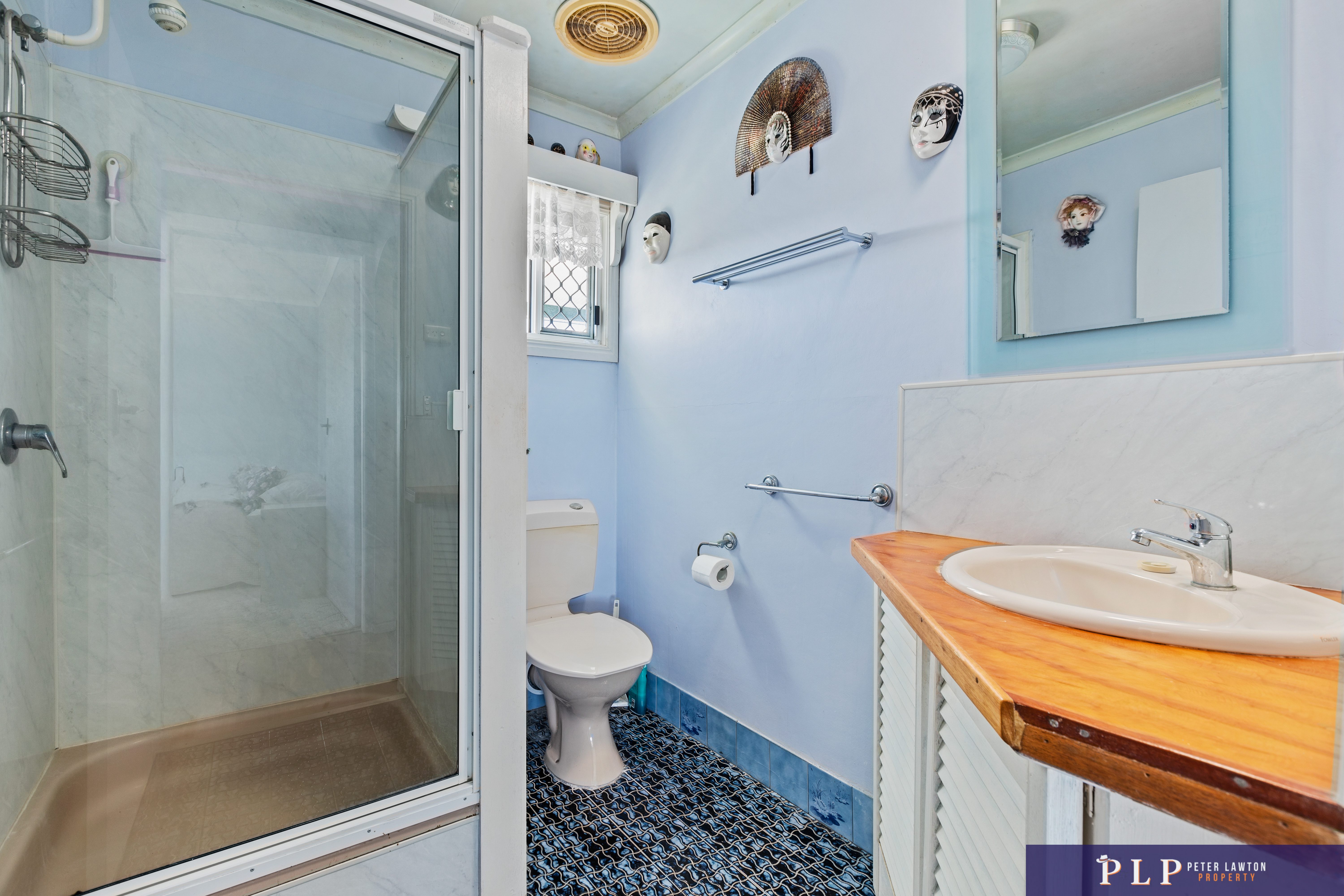 Spacious Dual-Level Home with OCEAN VIEWS, Shed, Solar & Extras Galore