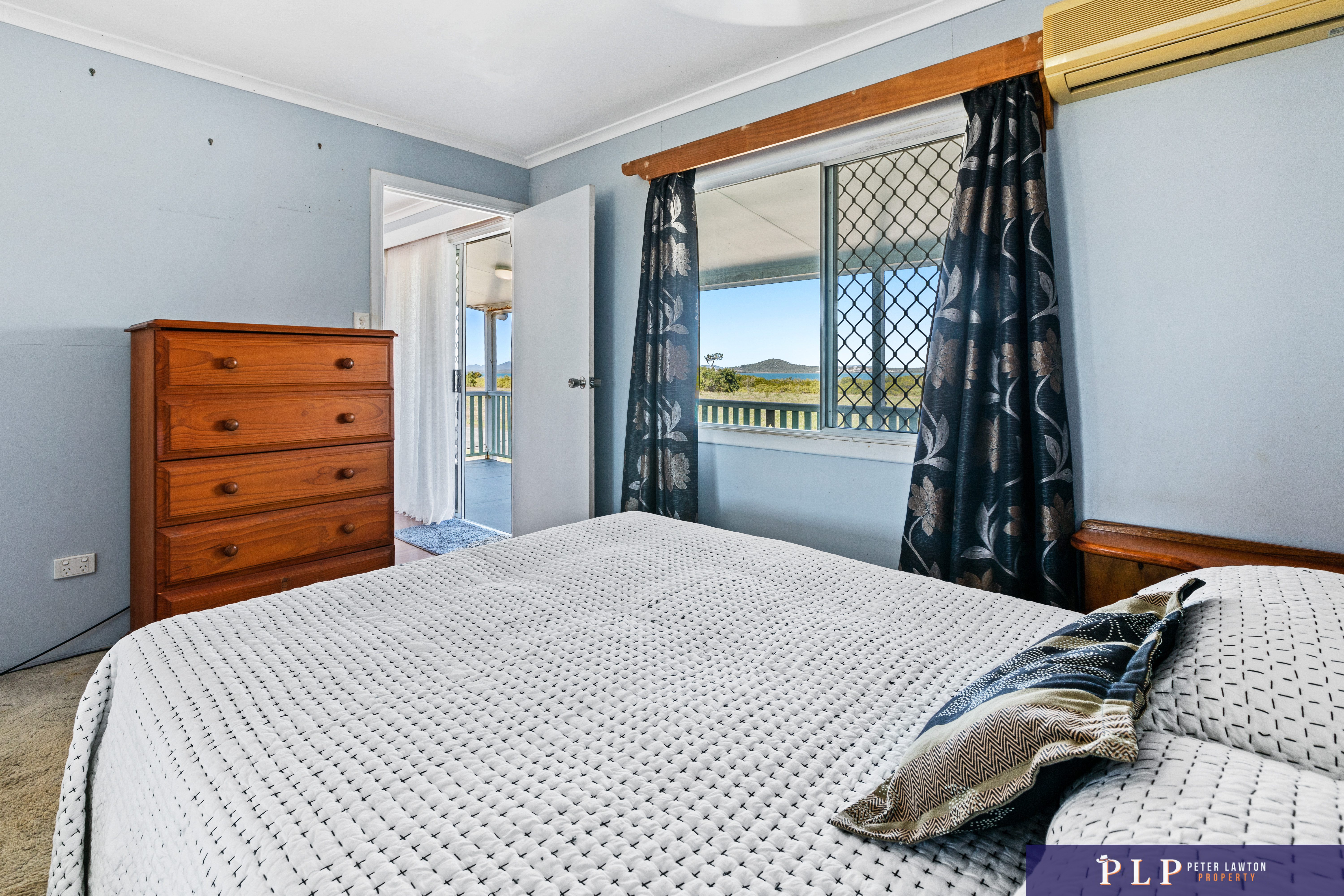 Spacious Dual-Level Home with OCEAN VIEWS, Shed, Solar & Extras Galore