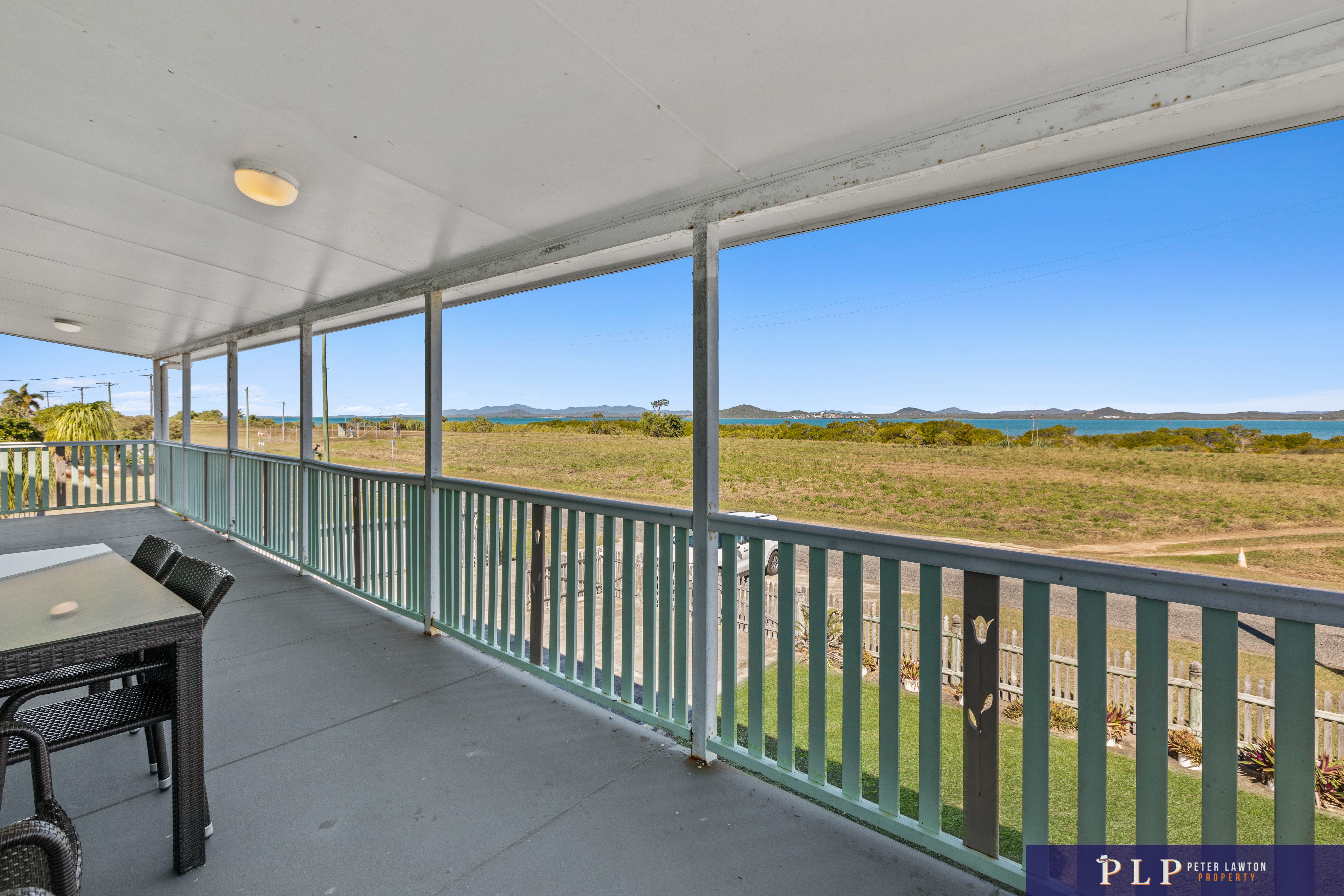 Spacious Dual-Level Home with OCEAN VIEWS, Shed, Solar & Extras Galore