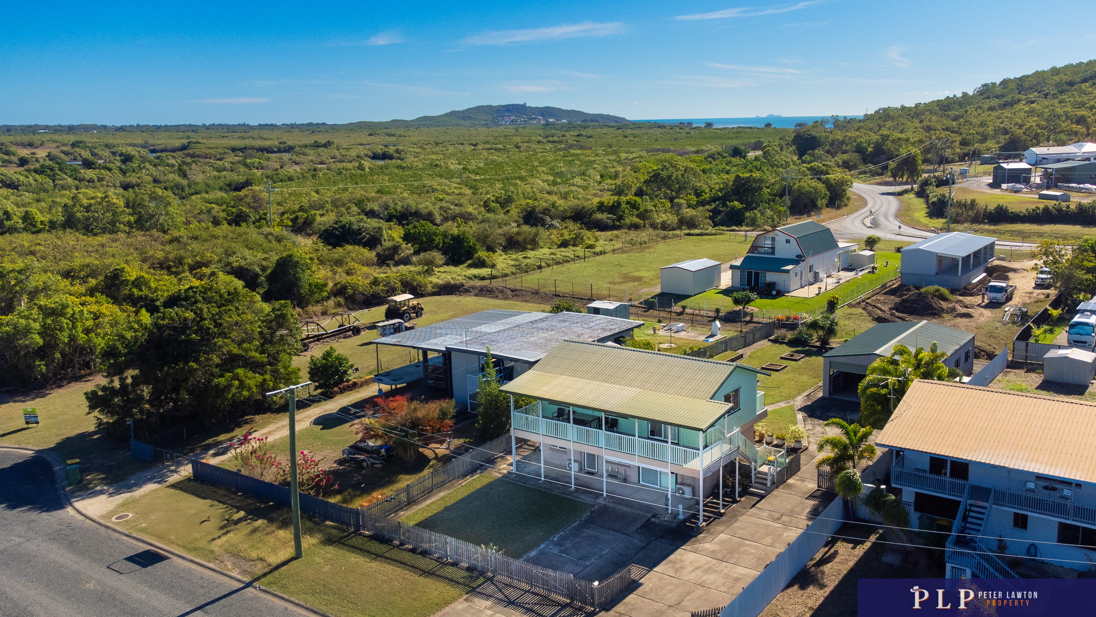 Spacious Dual-Level Home with OCEAN VIEWS, Shed, Solar & Extras Galore