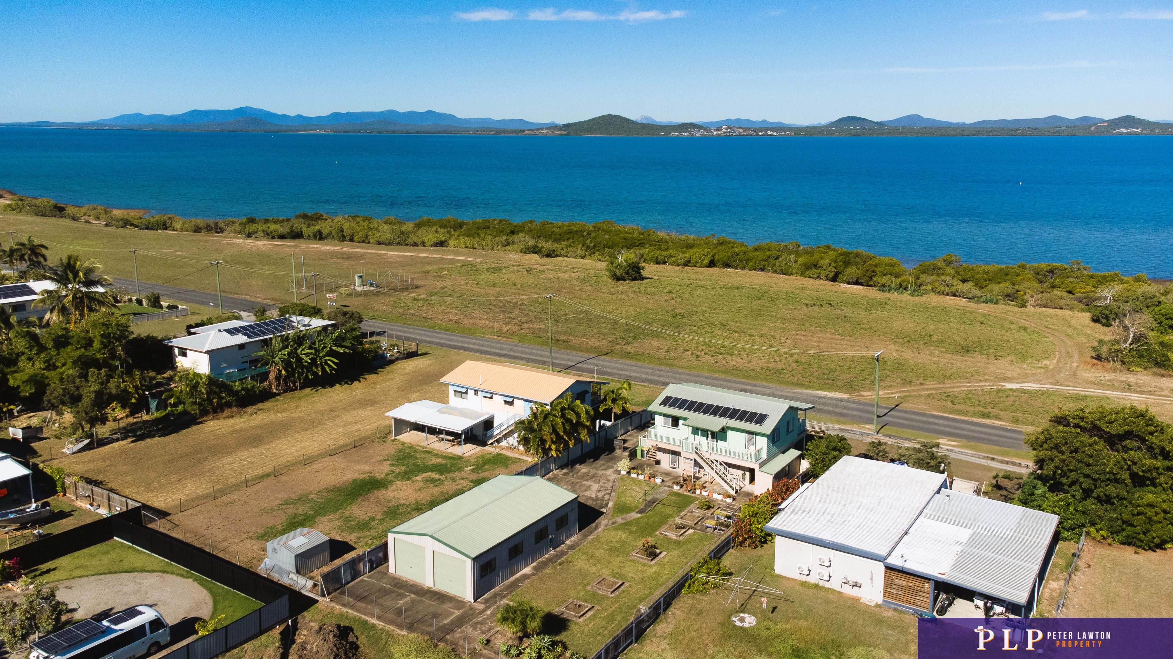 Spacious Dual-Level Home with OCEAN VIEWS, Shed, Solar & Extras Galore